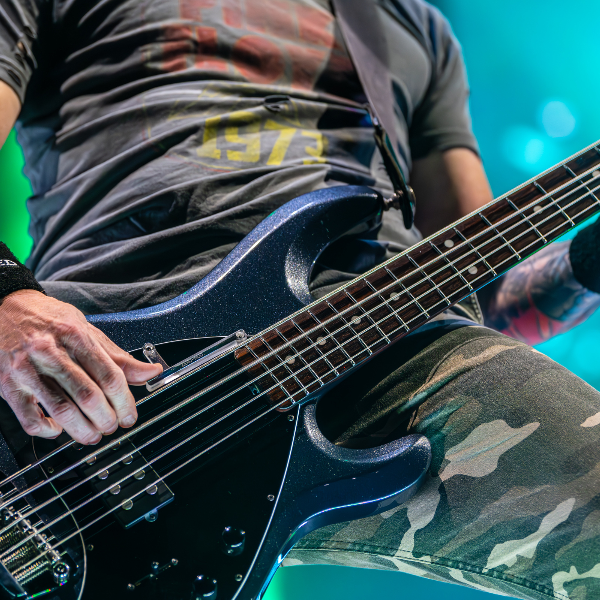 a picture of a band member rocking out