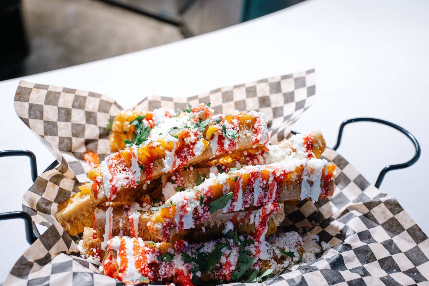 Street corn in a food basket