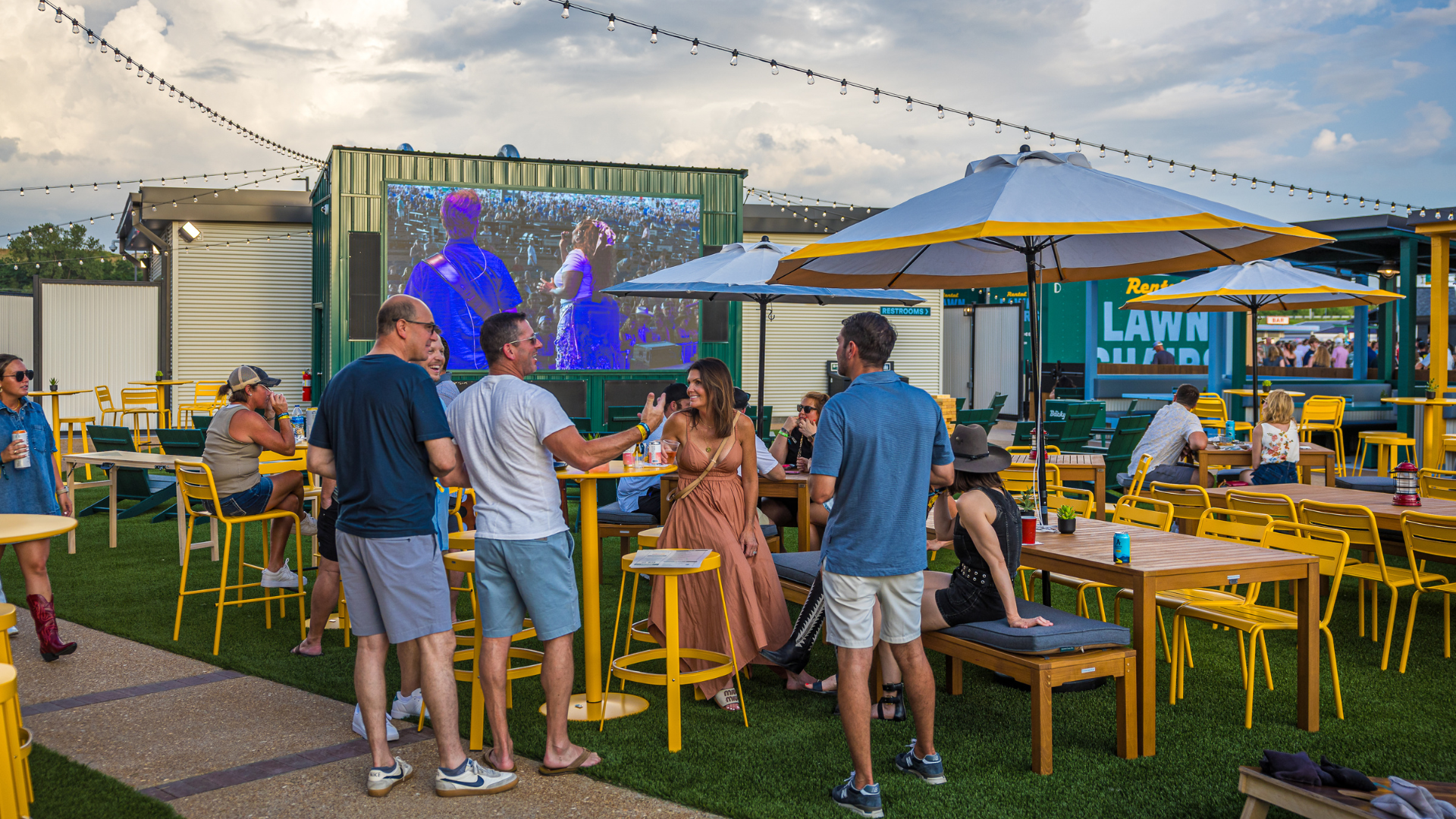 Photo of people enjoying the VIP Club area sitting around a table.
Live Nation presents Chris Stapleton at Hollywood Casino Amphitheater in St. Louis, Missouri on July 11, 2025. (Photo by Alive Coverage for Live Nation)