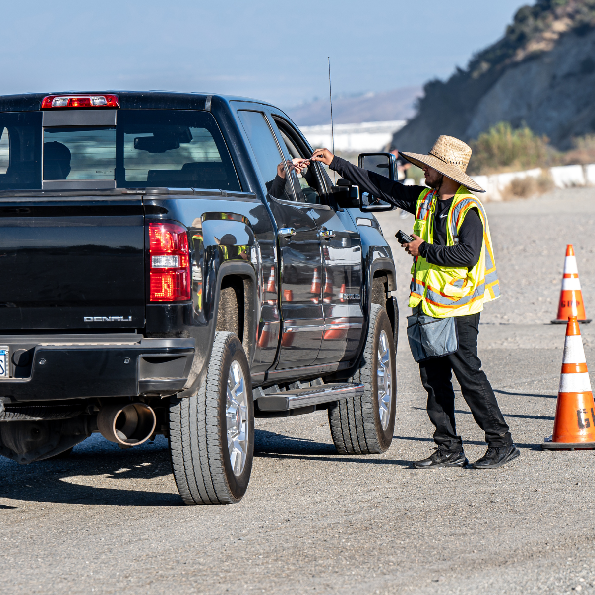 an attendent helping a patron park