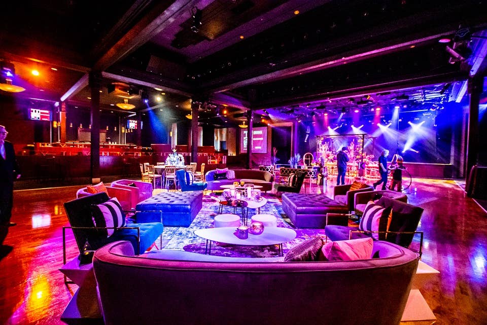 commodore ballroom set up with couches and tables for a private event