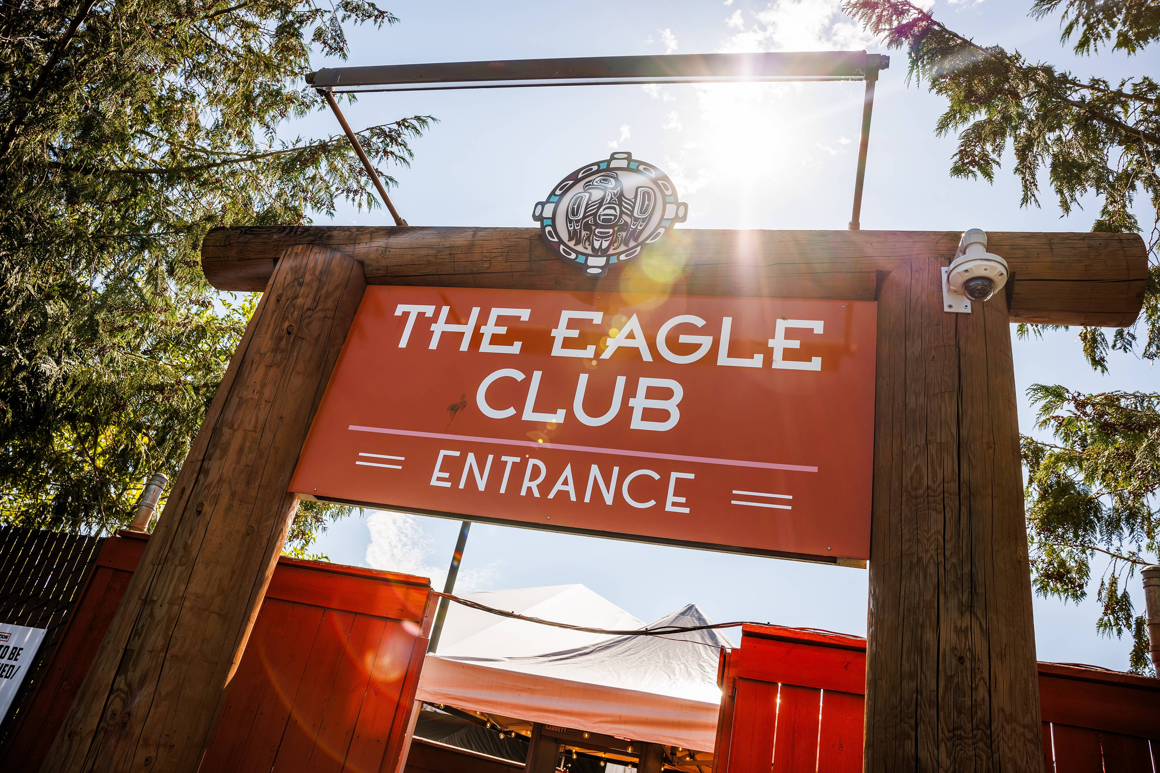 The eagle club entrance sign 