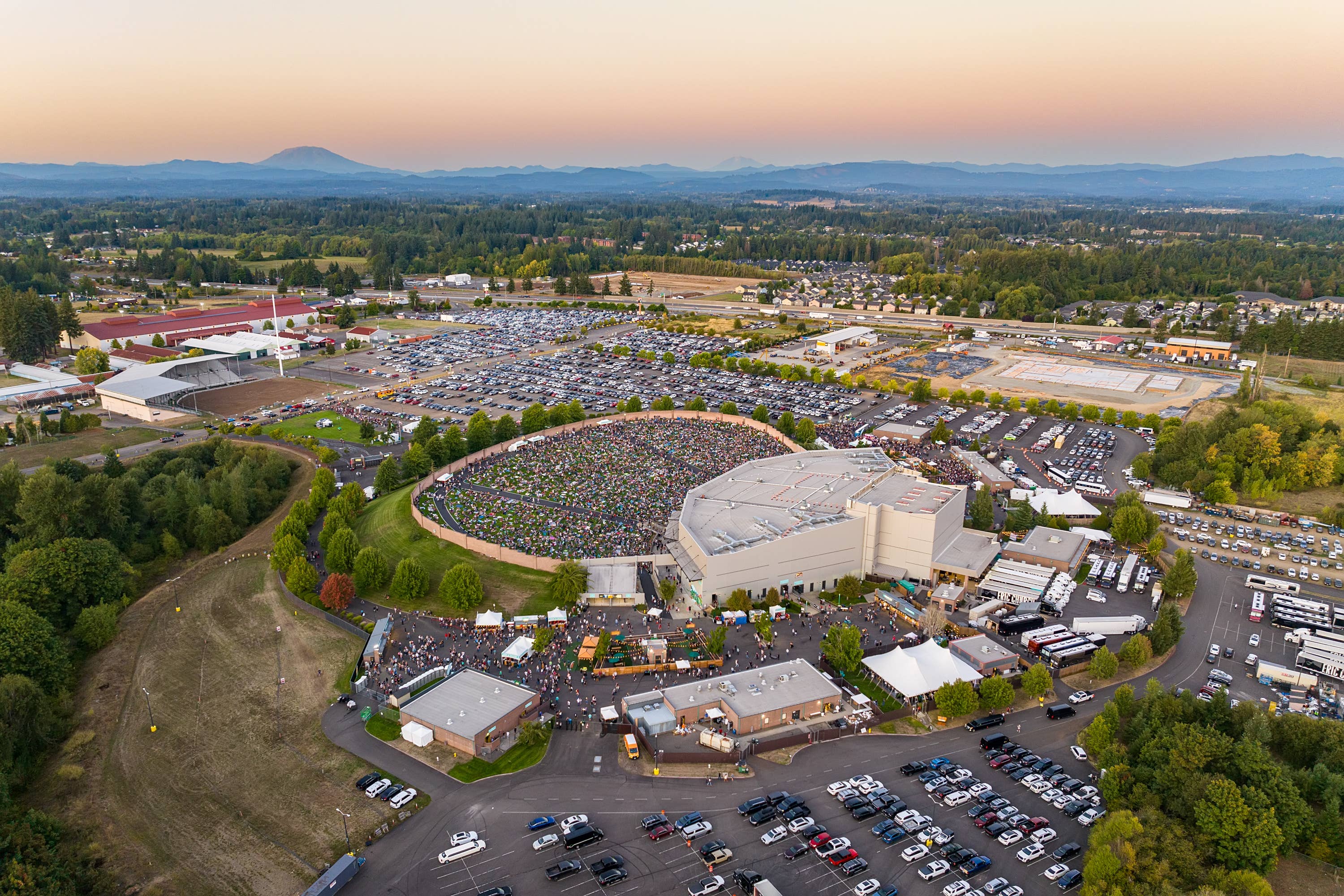 An aerial view of the full parking lot at Cascades Amphitheater