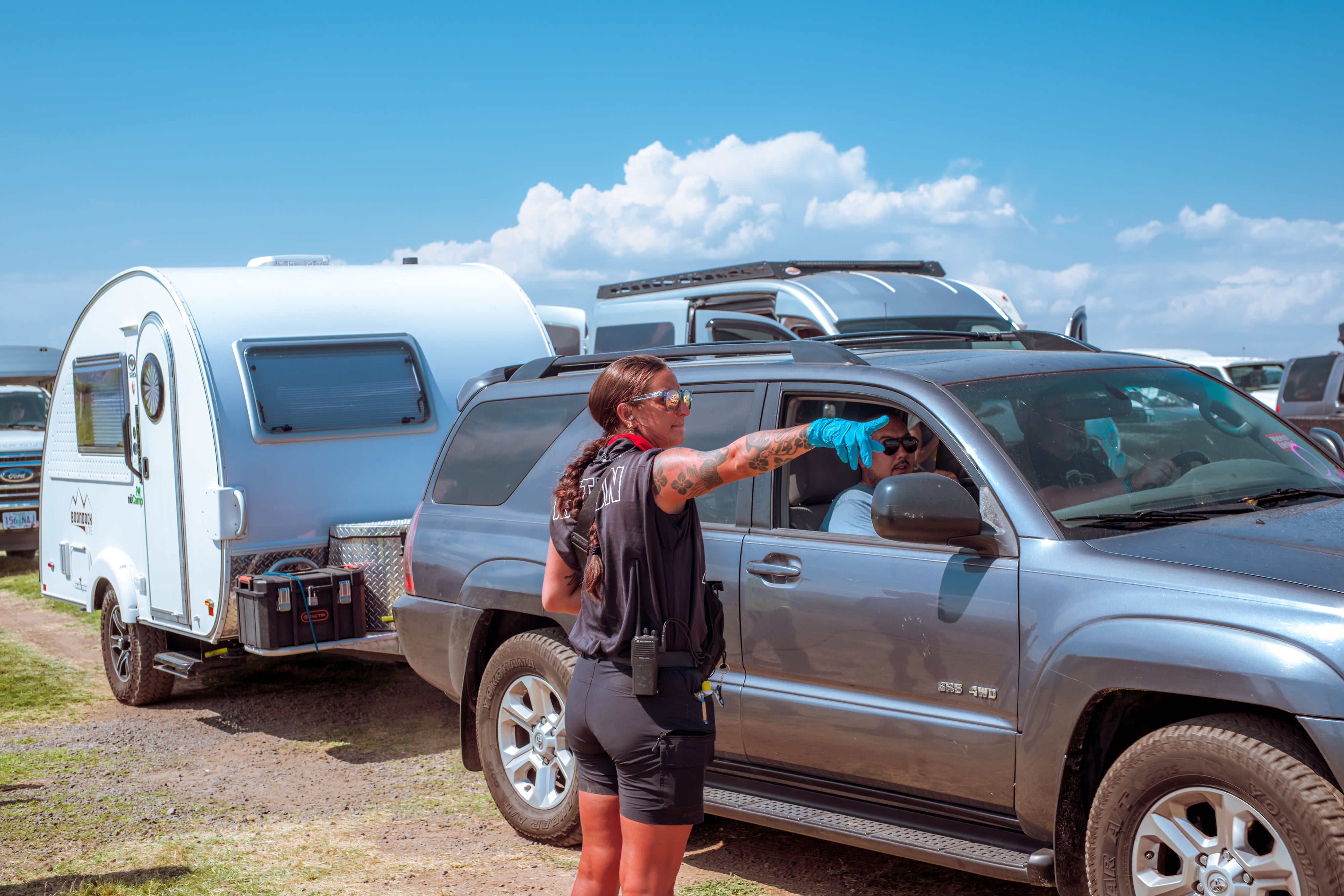 Employee directing someone parking 