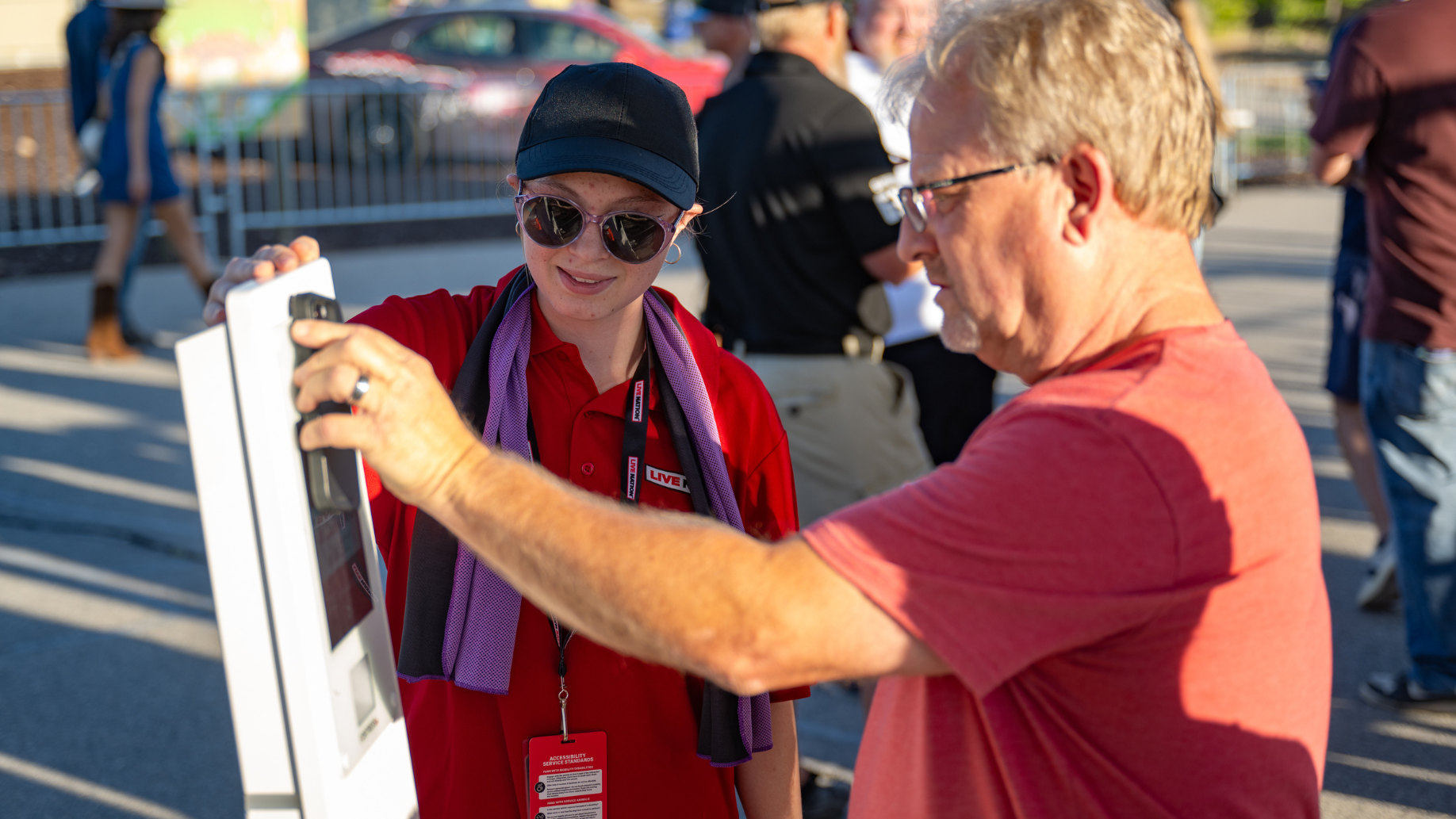 Scanning tickets at the venue.
