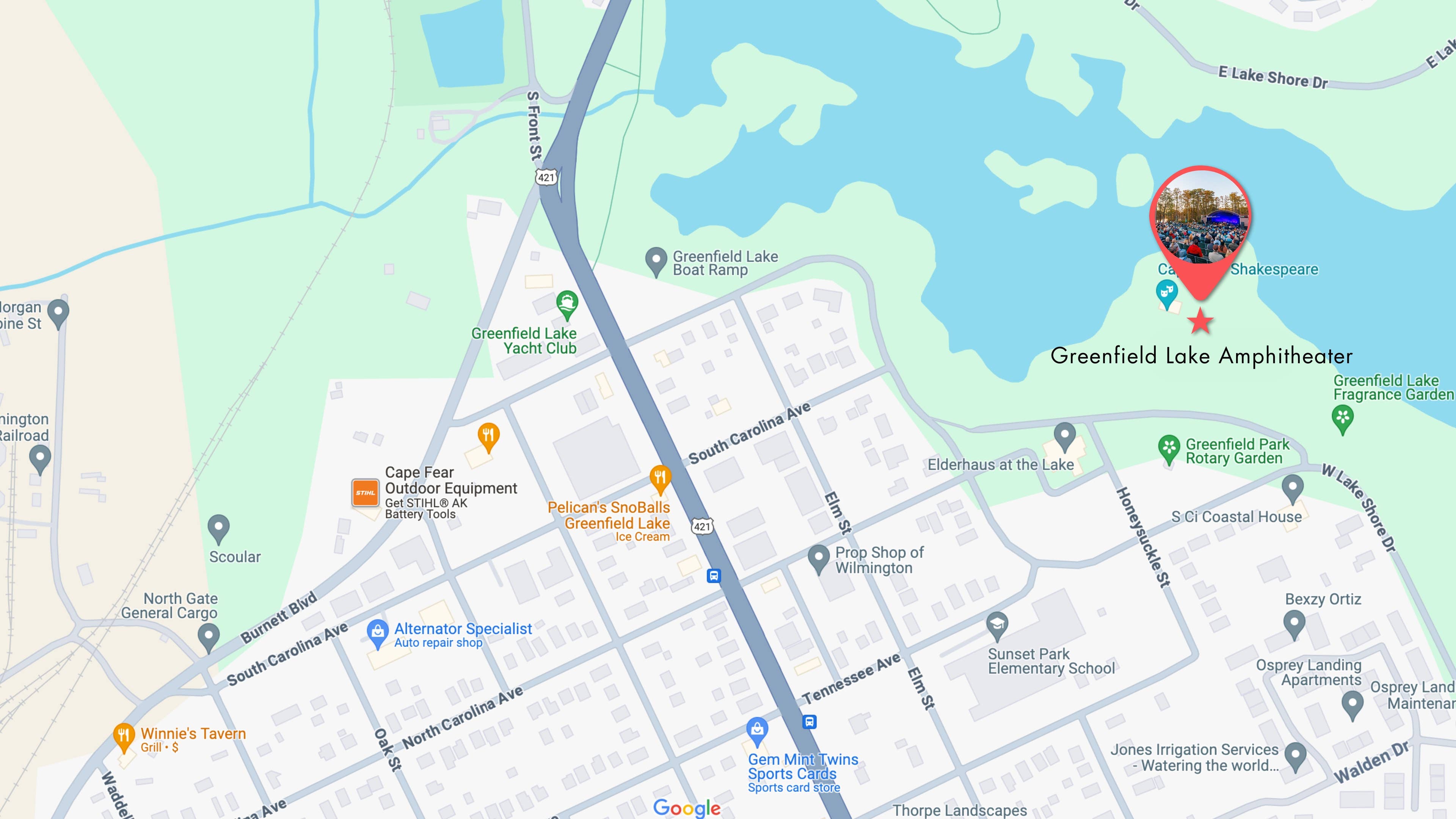 A map of the surrounding streets and a pin indicating where Greenfield Lake Amphitheater is located. 