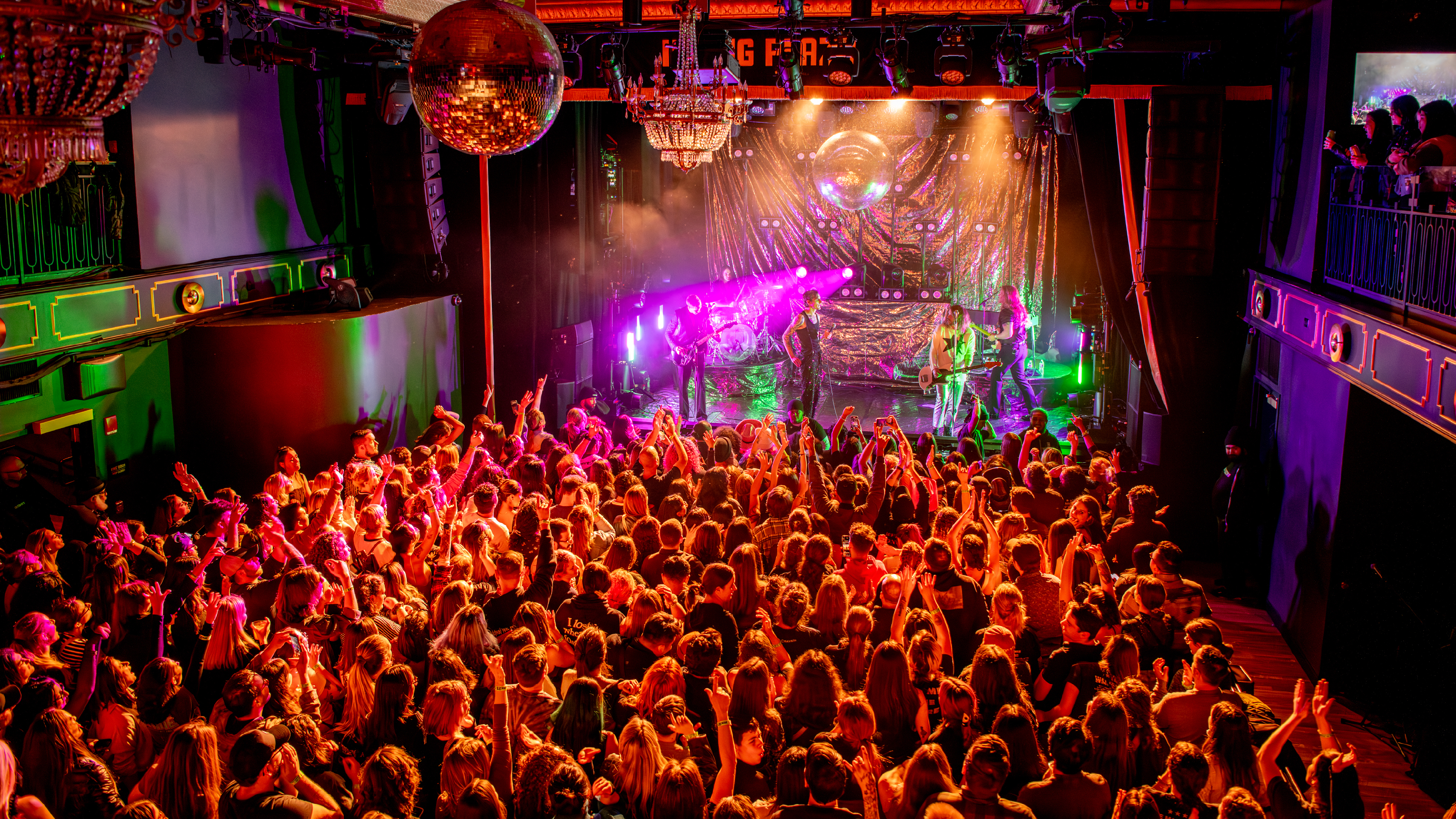 a photo taken from the balcony of Irving Plaza overlooking a crowd watching a show