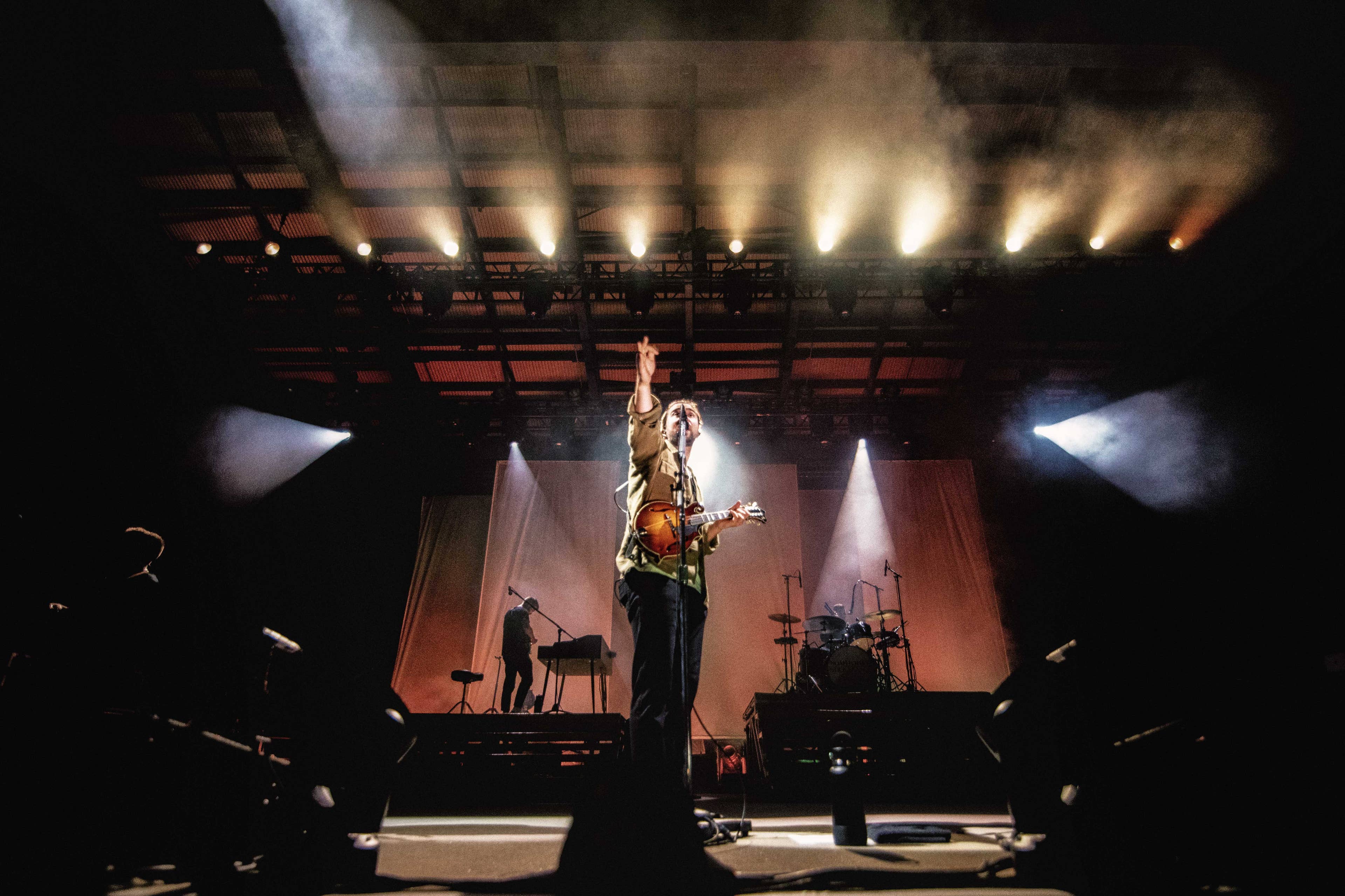 A photo of Noah Kahan performing at Skyla Credit Union Amphitheatre. 