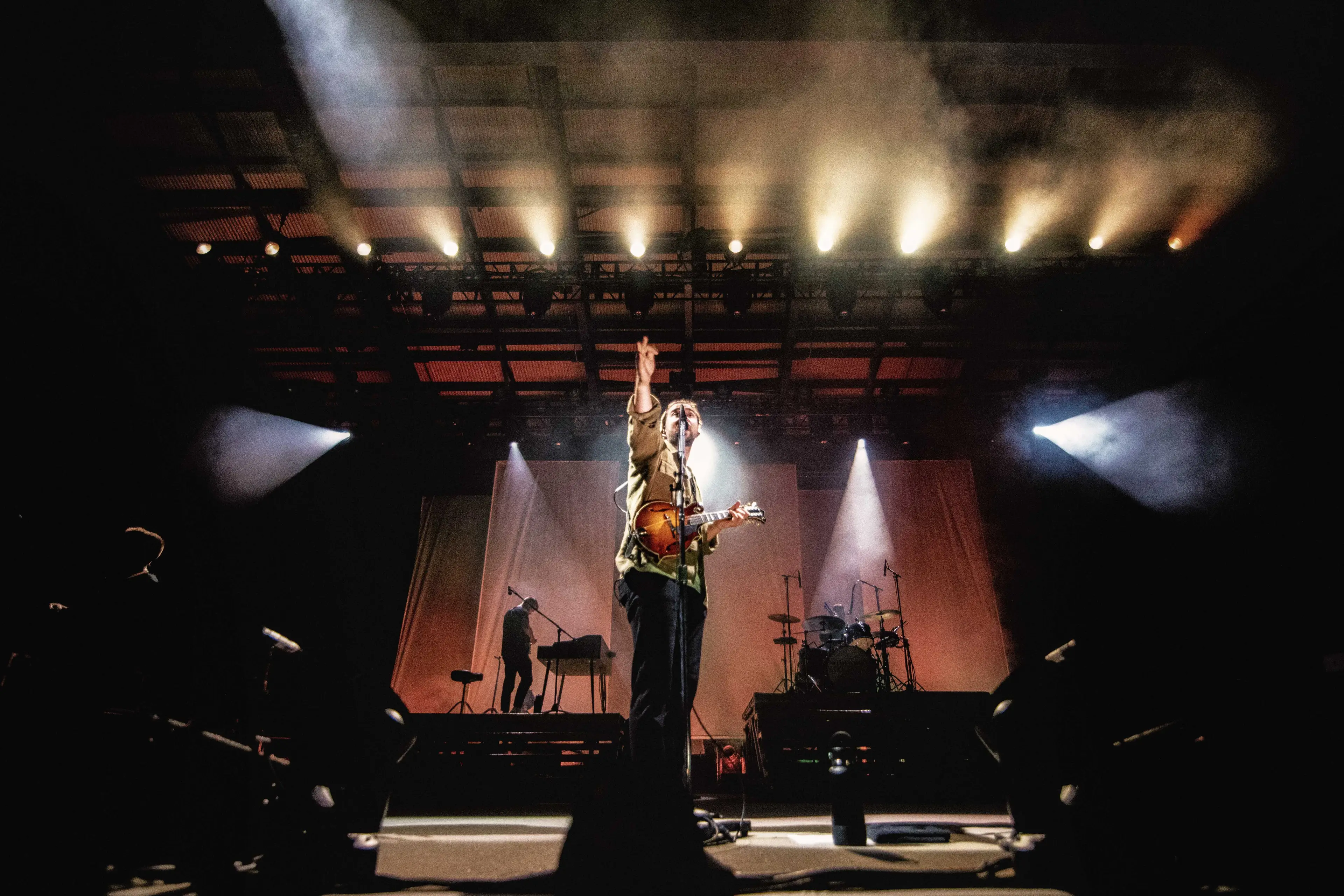 A photo of Noah Kahan performing at Skyla Credit Union Amphitheatre. 