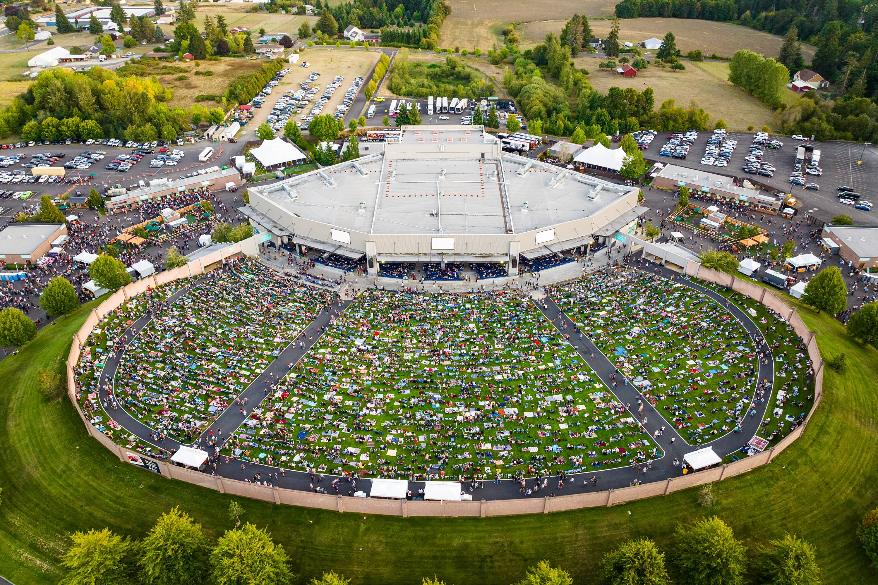 Drone photo showing a full lawn at Cascades Amphitheater