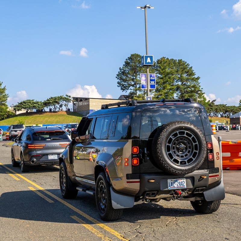 Cars driving into the parking area at Truliant Amphitheater.
