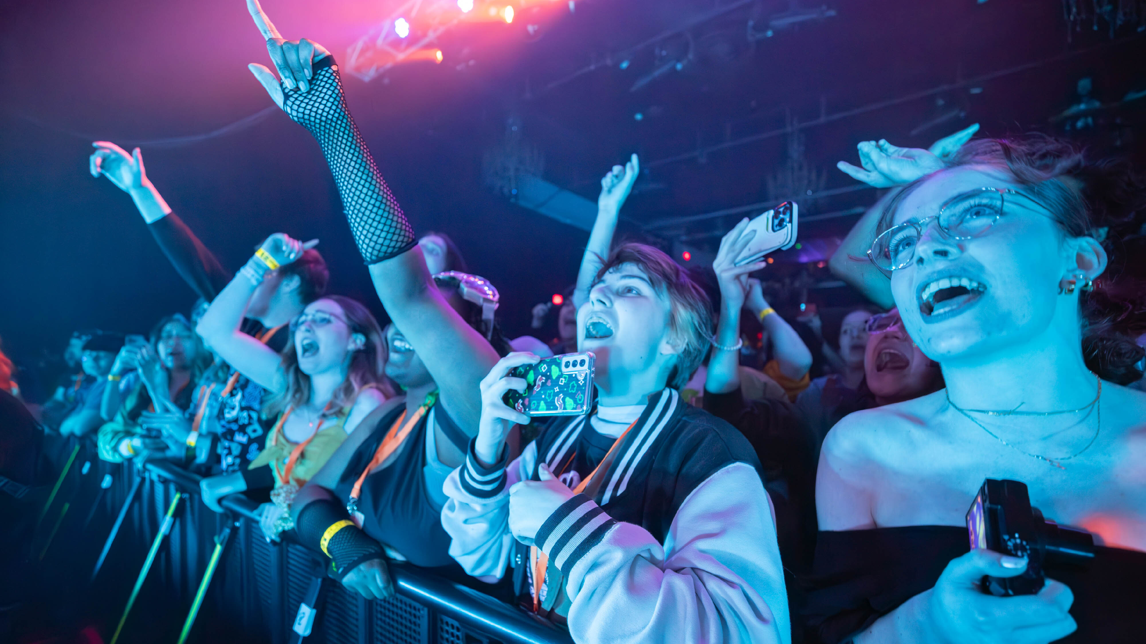 Fans in the front row of a concert