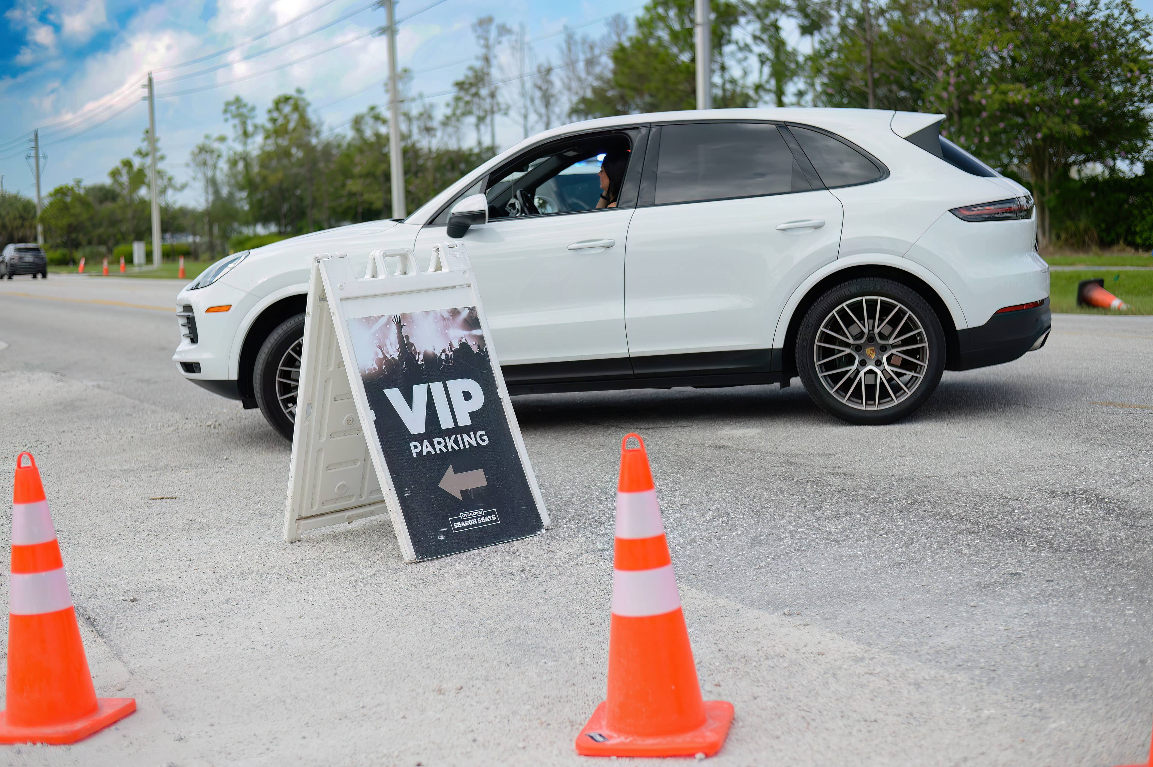 A car pulling up to the VIP Parking lot