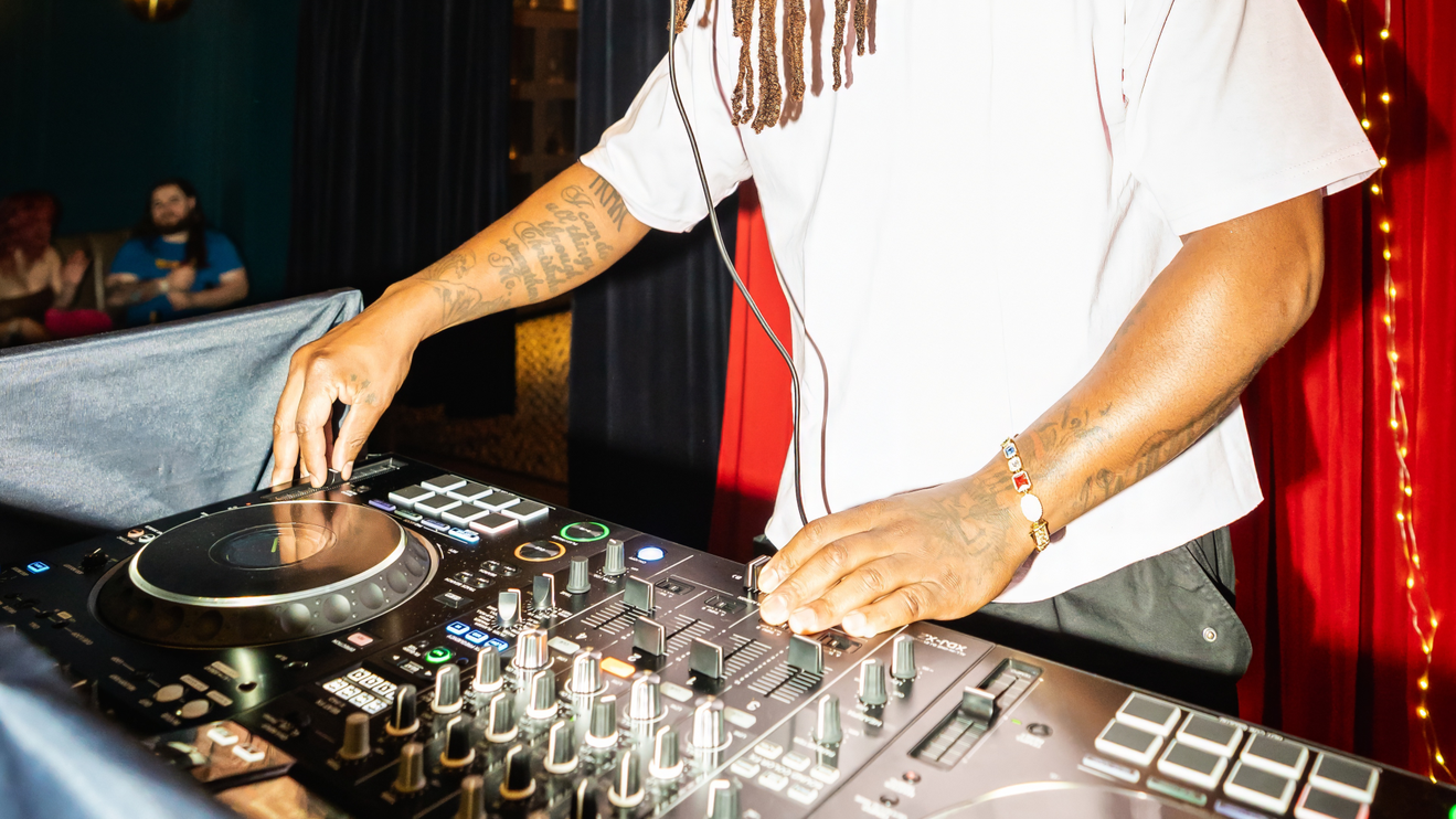 A DJ performs at Good Luck Lounge