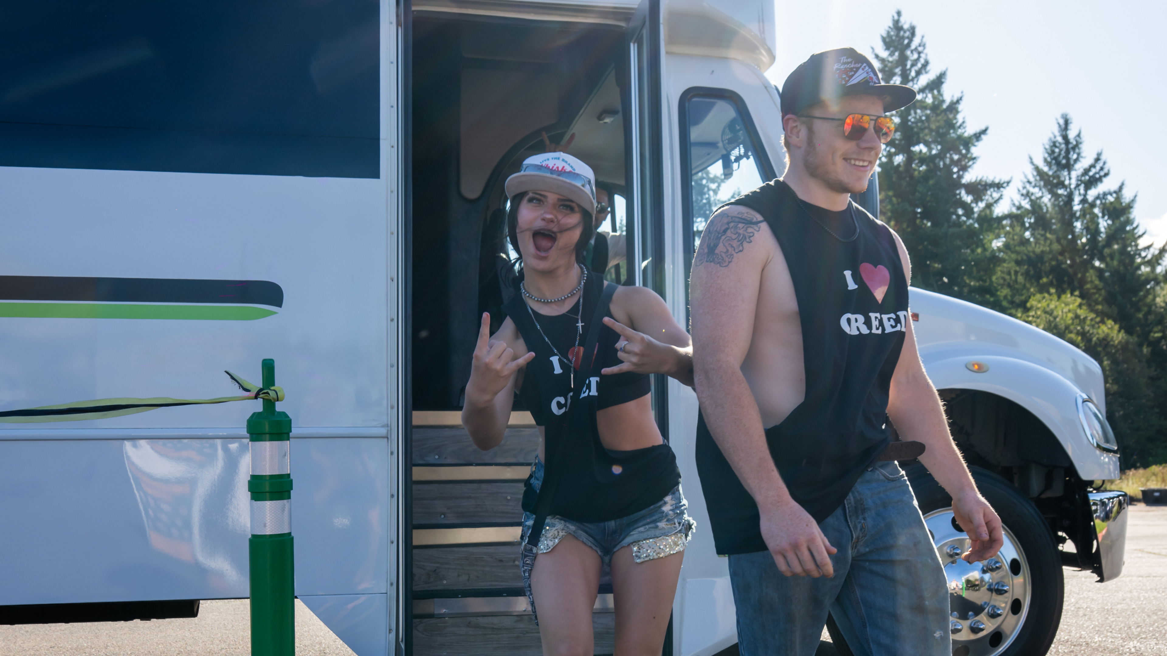 Concertgoers arriving by shuttle service at Lakewood Amphitheatre