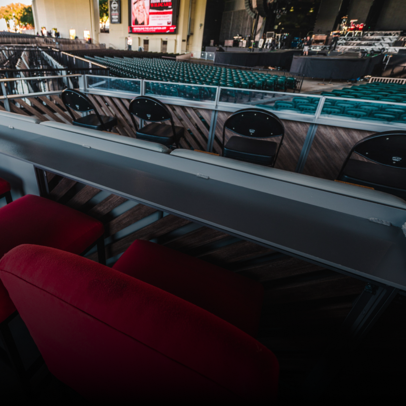 Empty seats with a view of the stage behind 