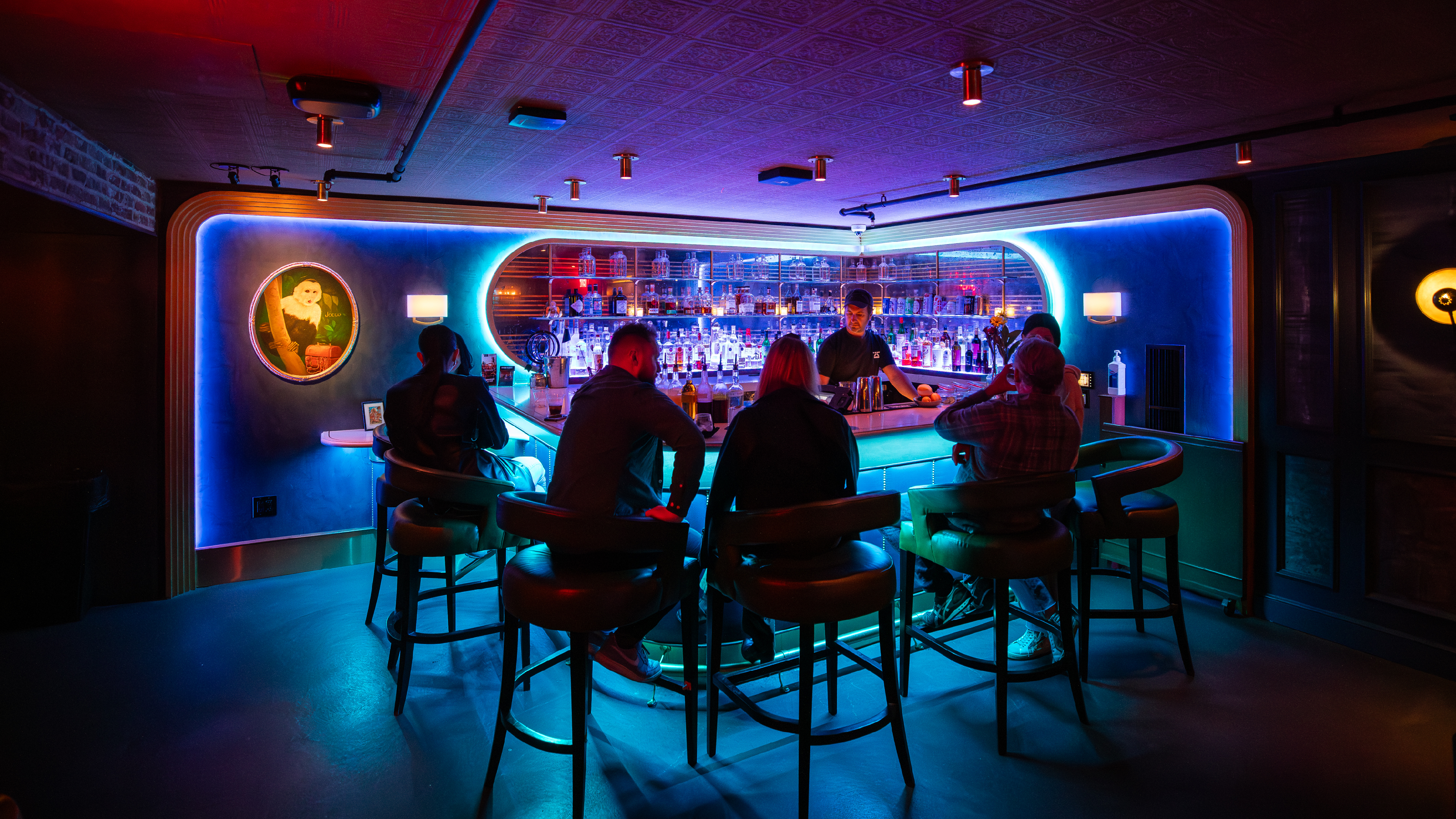 Customers sitting around the bar at Jocco's Ransom Lounge