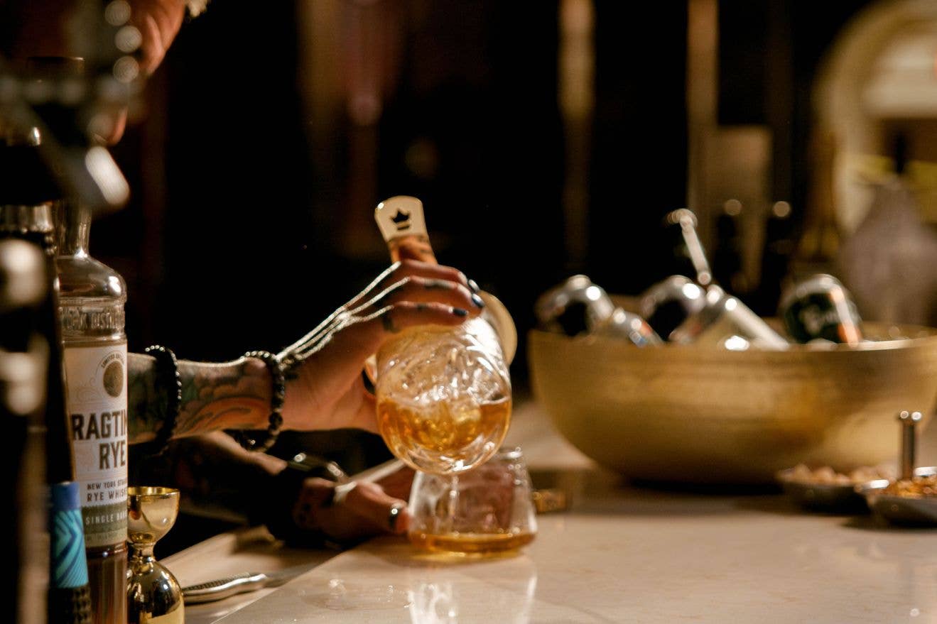 Bartender pouring a drink
