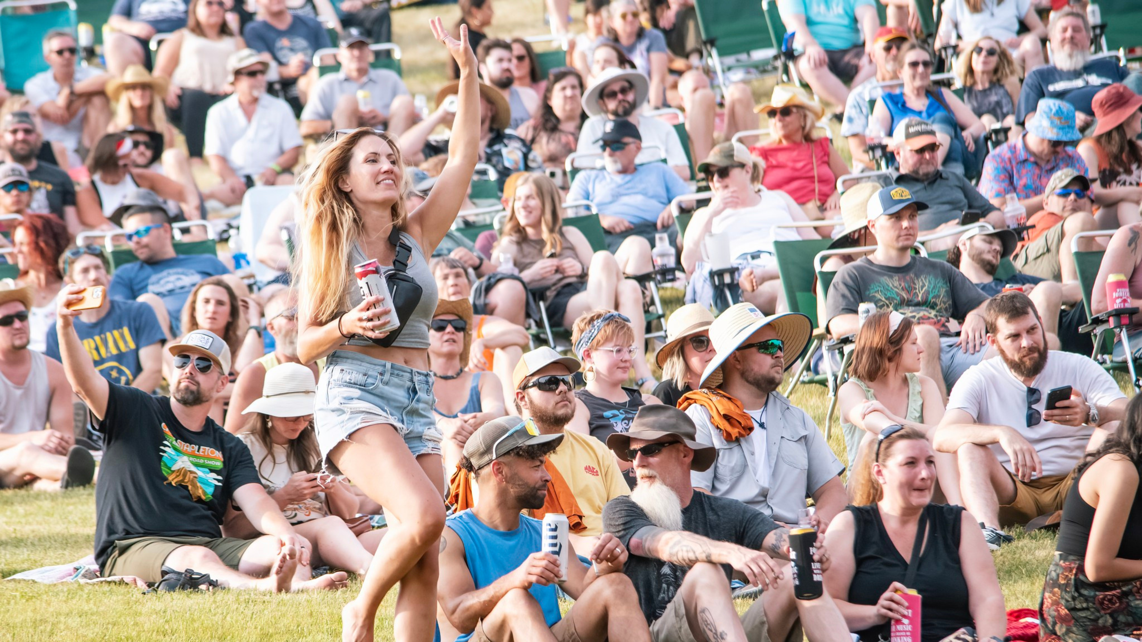 A crowd dancing on the lawn at Alpine Valley Music Theatre.