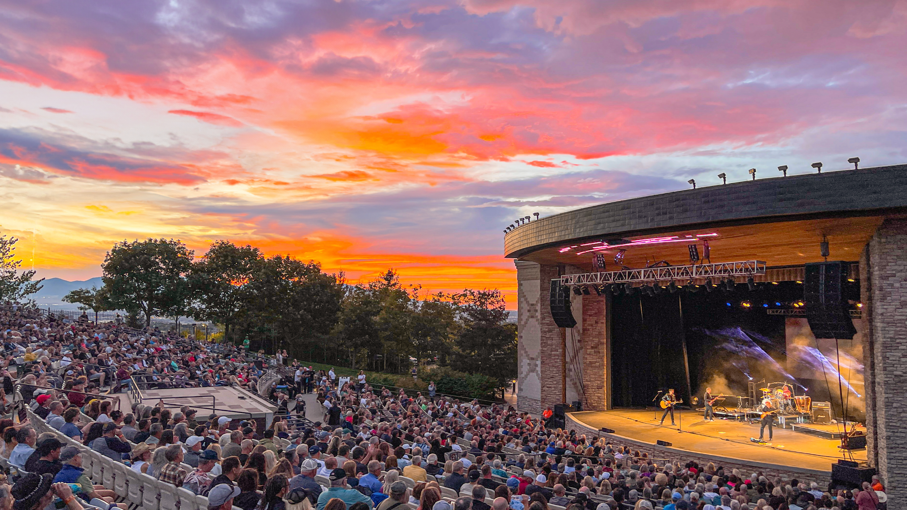 A crowd watching a performance at Sandy Amphitheatre