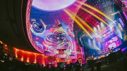 graphics displaying on the walls and ceiling within the venue
