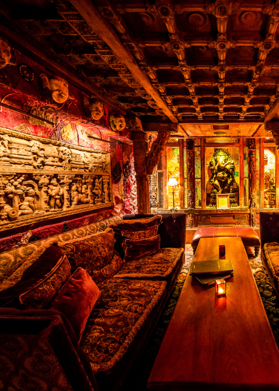 House of Blues Chicago's Foundation Room - a couch in a dimly lit room 