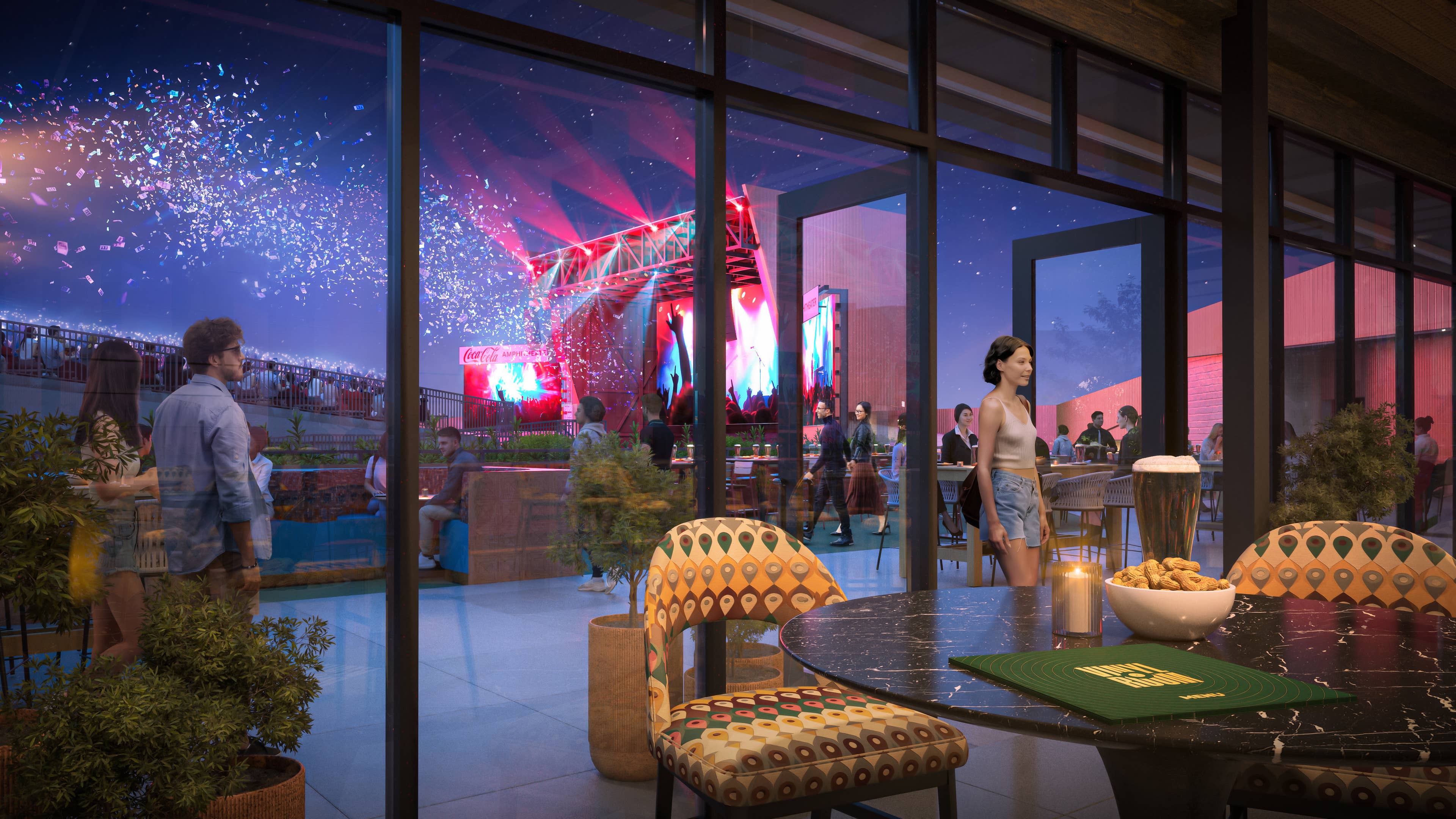 Fans inside of the VIP lounge watching the show