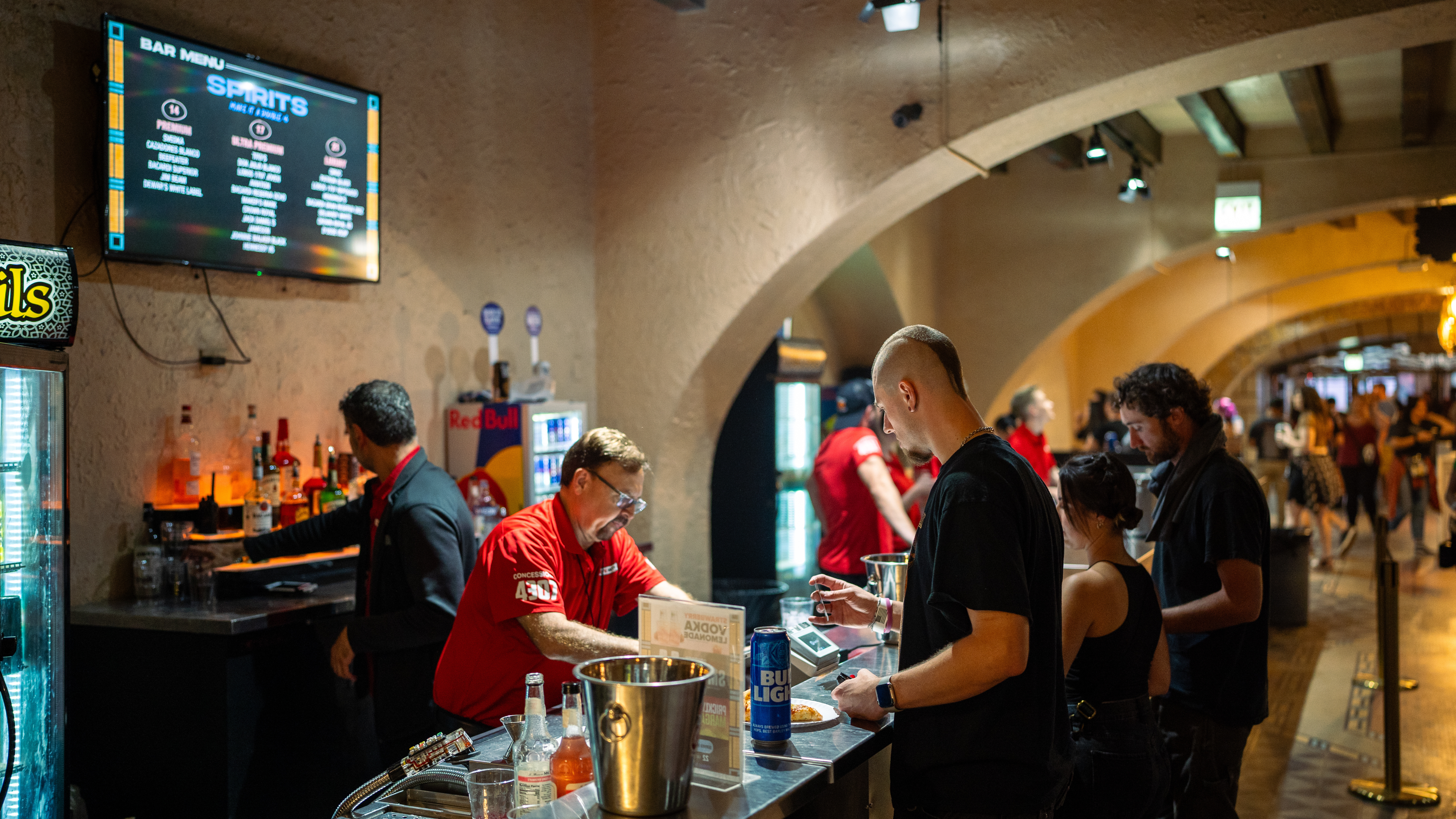 A bartender chats with a fan inside Byline Bank Aragon Ballroom.