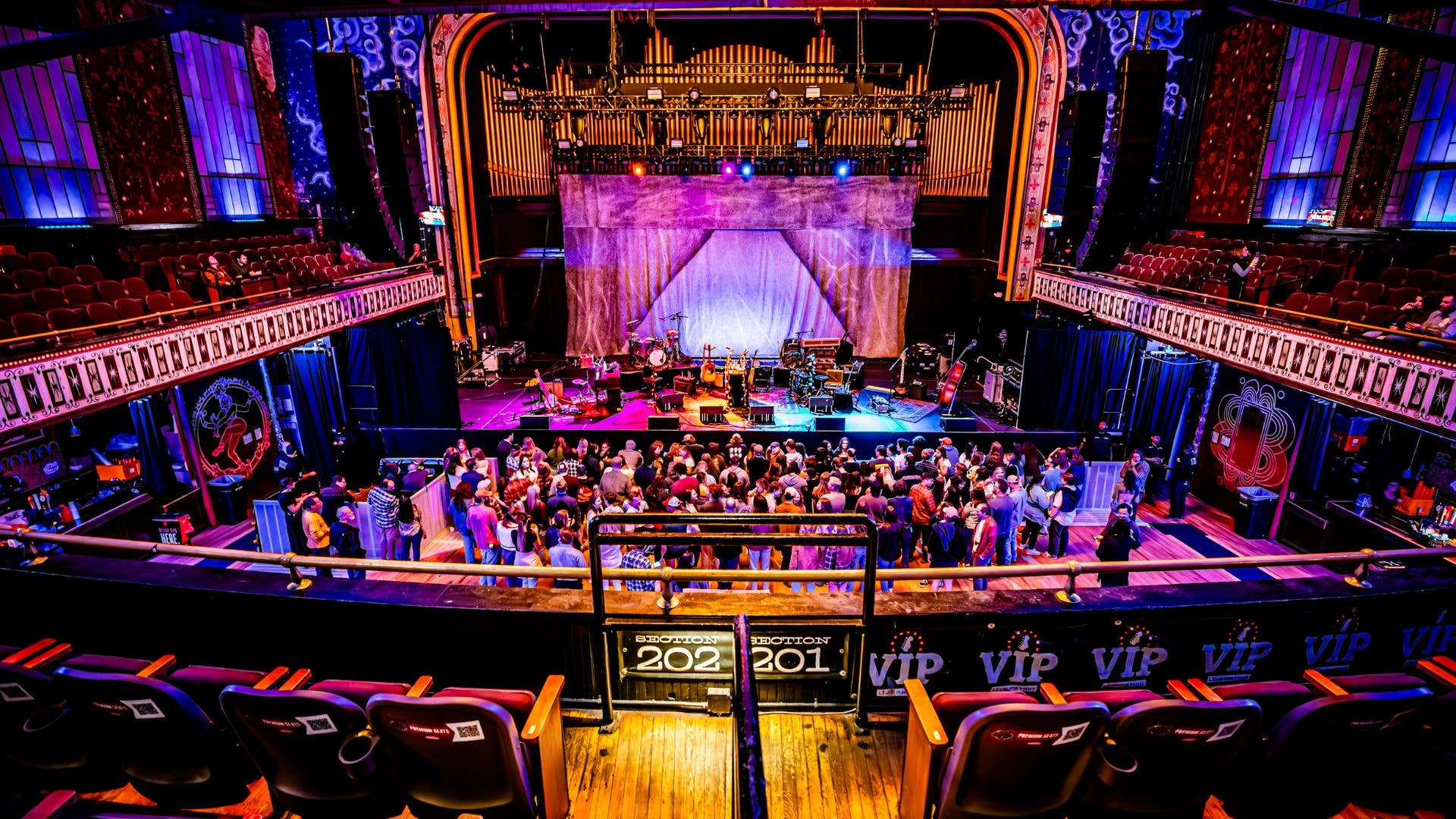 An image of the stage taken from the first row in the balcony