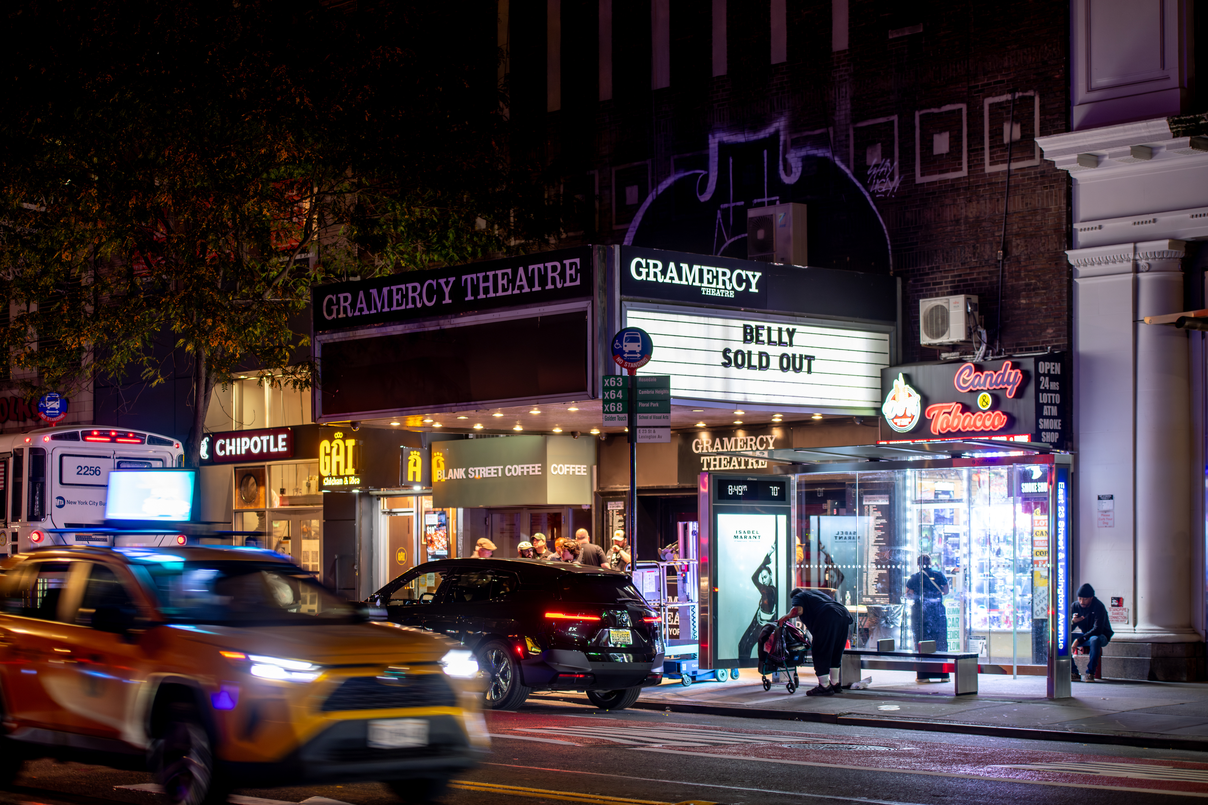 The Gramercy Theatre marquee, along with the surrounding businesses. 
