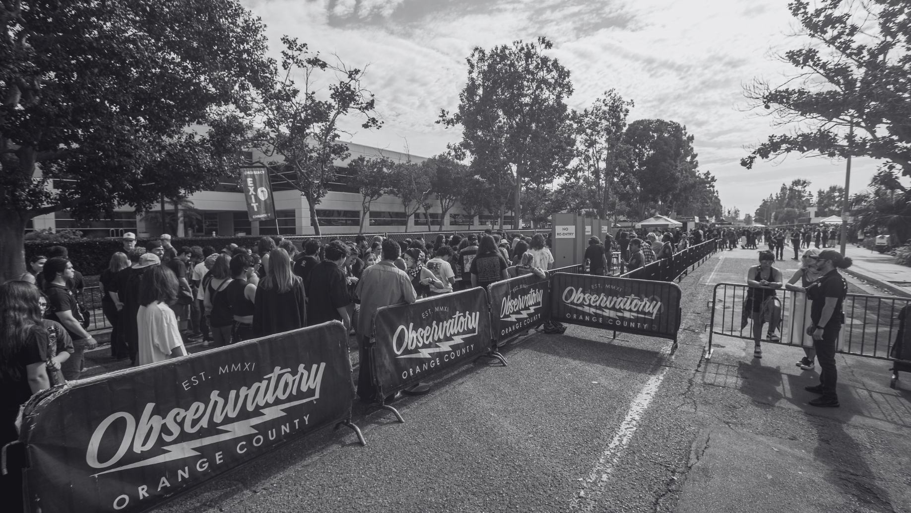 A crowd of people entering a show at the Observatory Festival Grounds