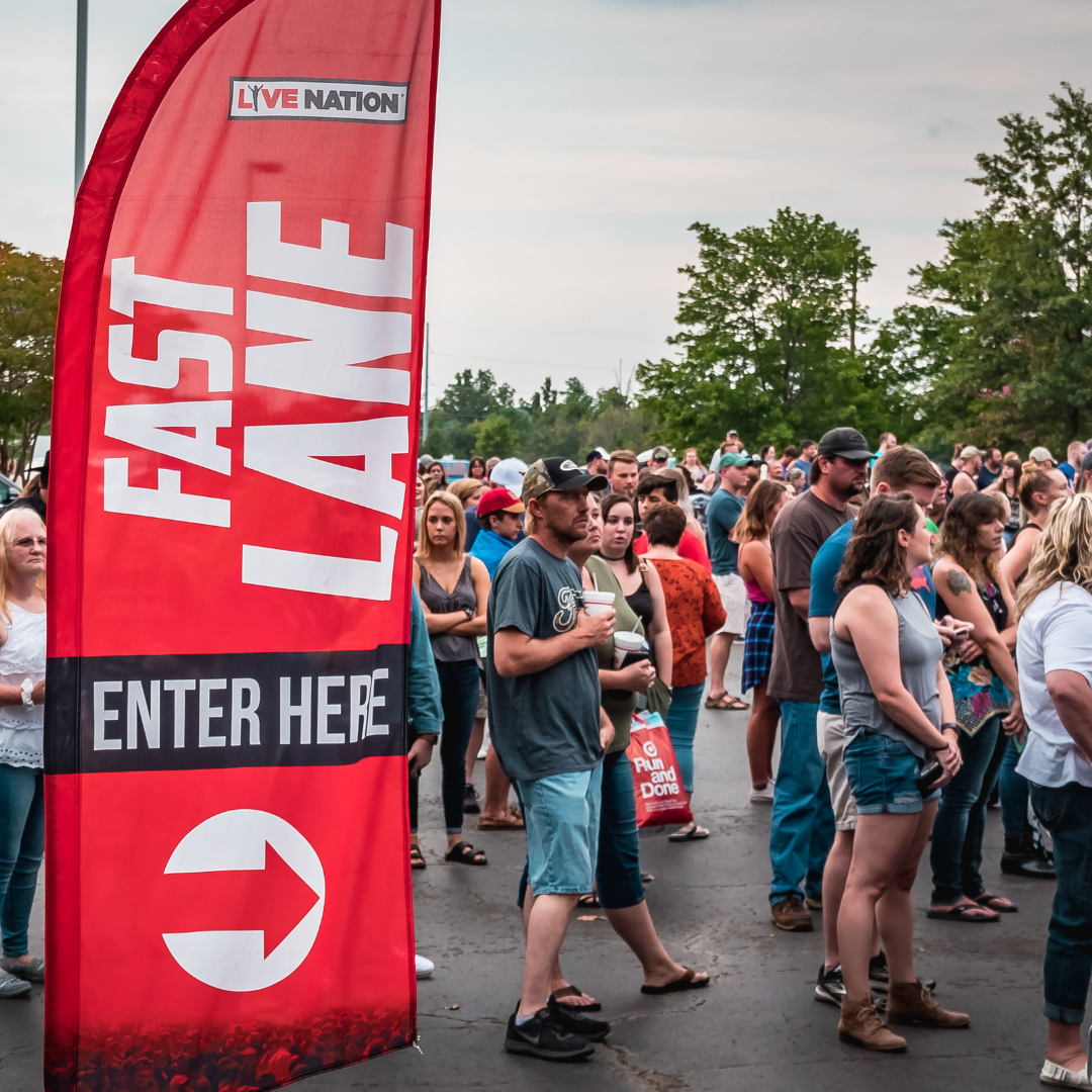 People standing in the Fast Lane line at the venue.
