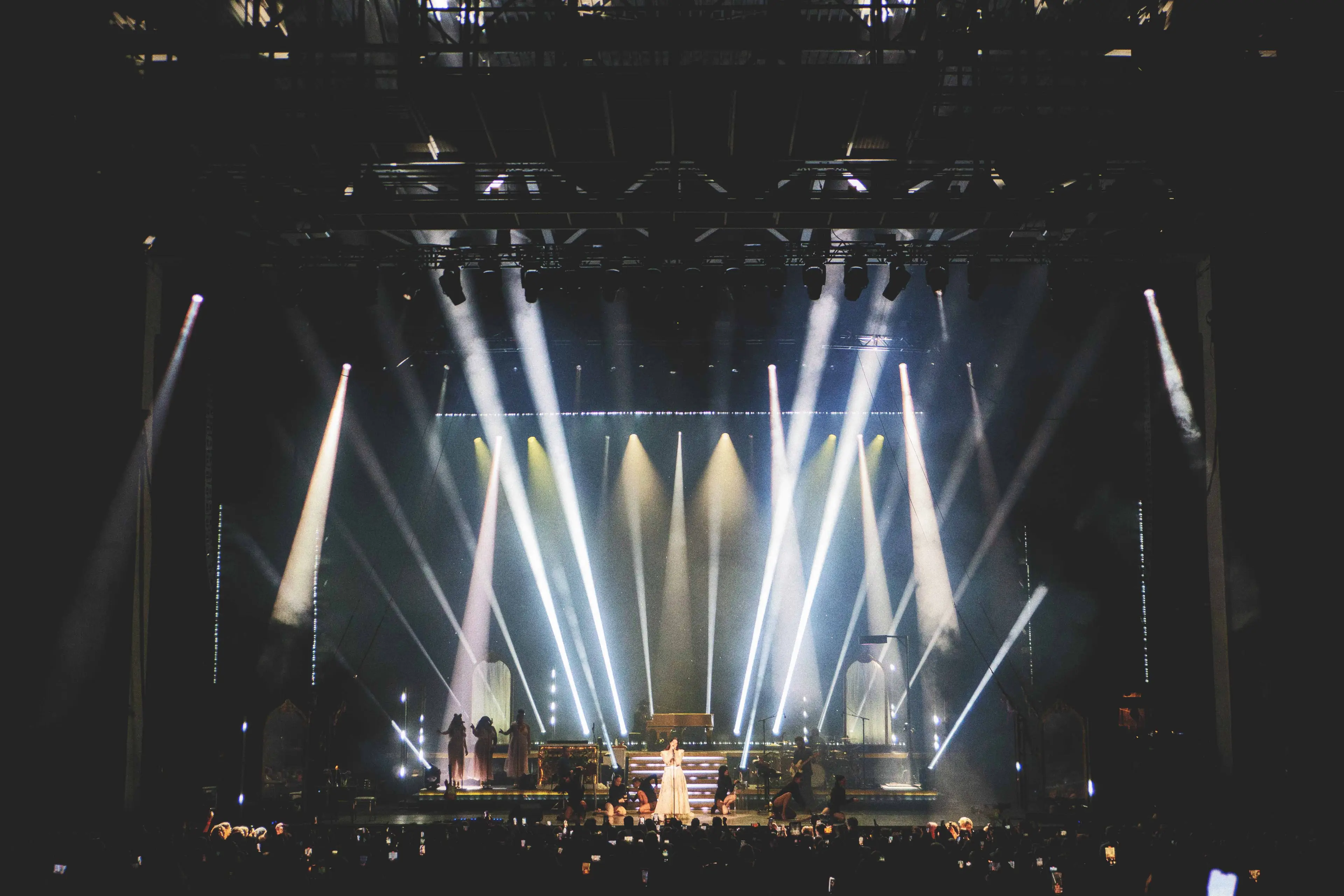 A picture of Lana Del Rey performing at Truliant Amphitheater.