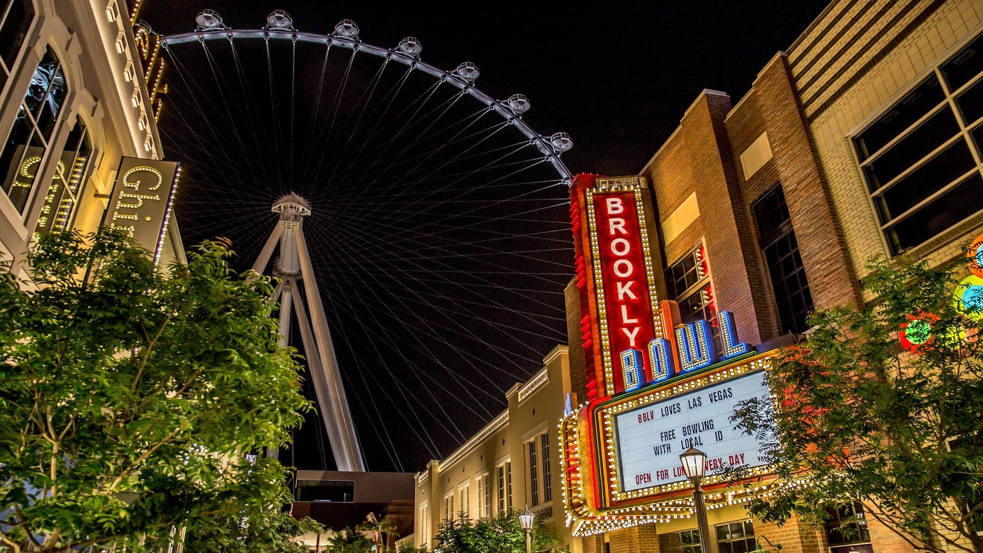 An external view of Broolyn Bowl Las Vegas with a view of the ferris wheel in the background. 