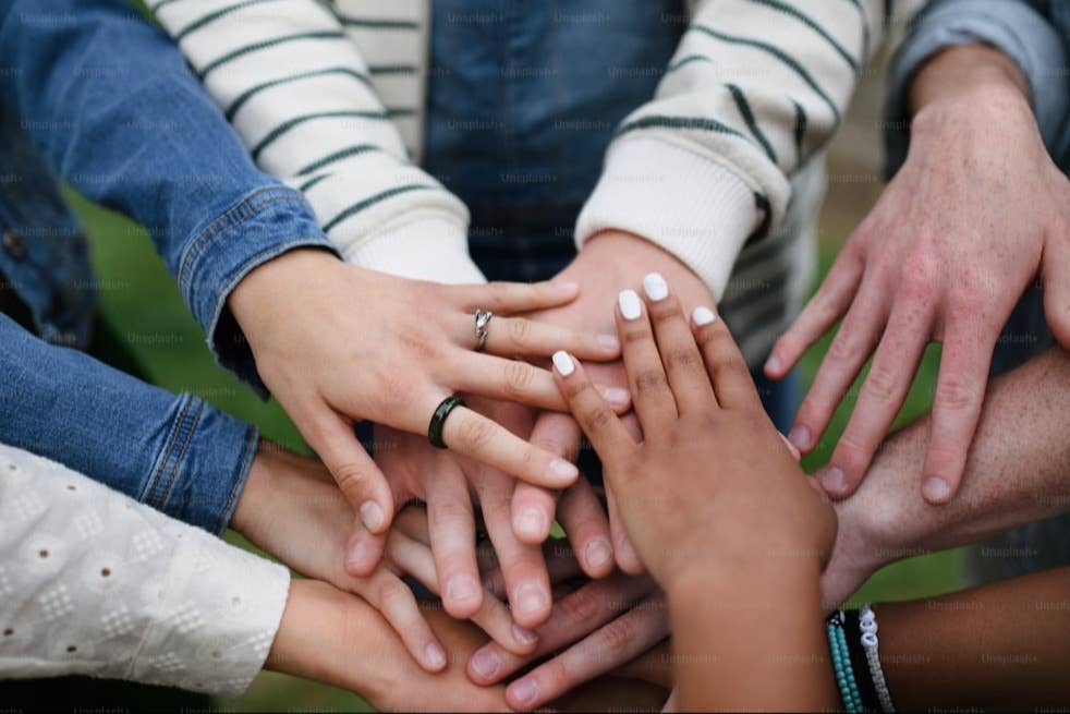 A close up of people's hands