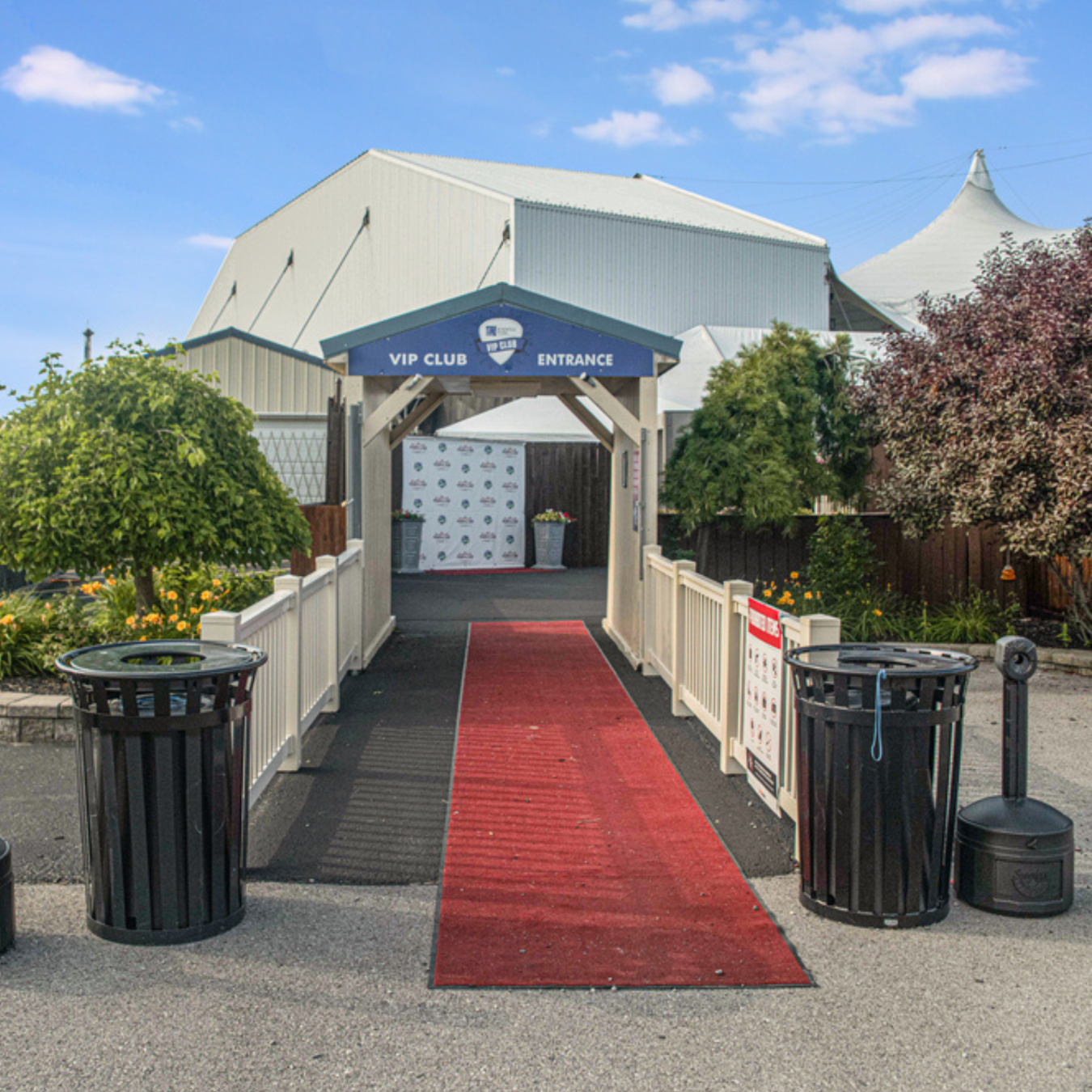 A red carpet leading up to the VIP Club entrance