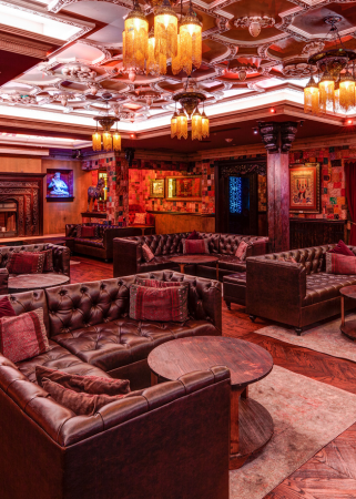 House of Blues Dallas' Foundation Room - a room full of couches and chandeliers 