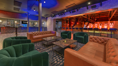 Our Marquee Lounge area with no one in it, showing the couches and tables that are in the lounge