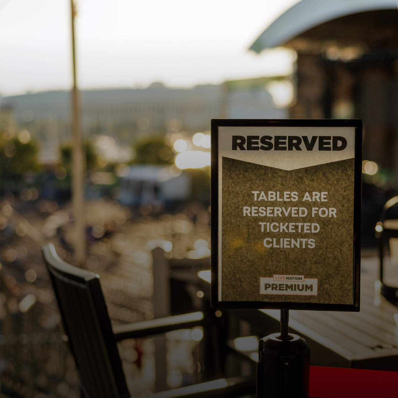 A sign that states "Reserved - Tables are reserved for ticketed clients"