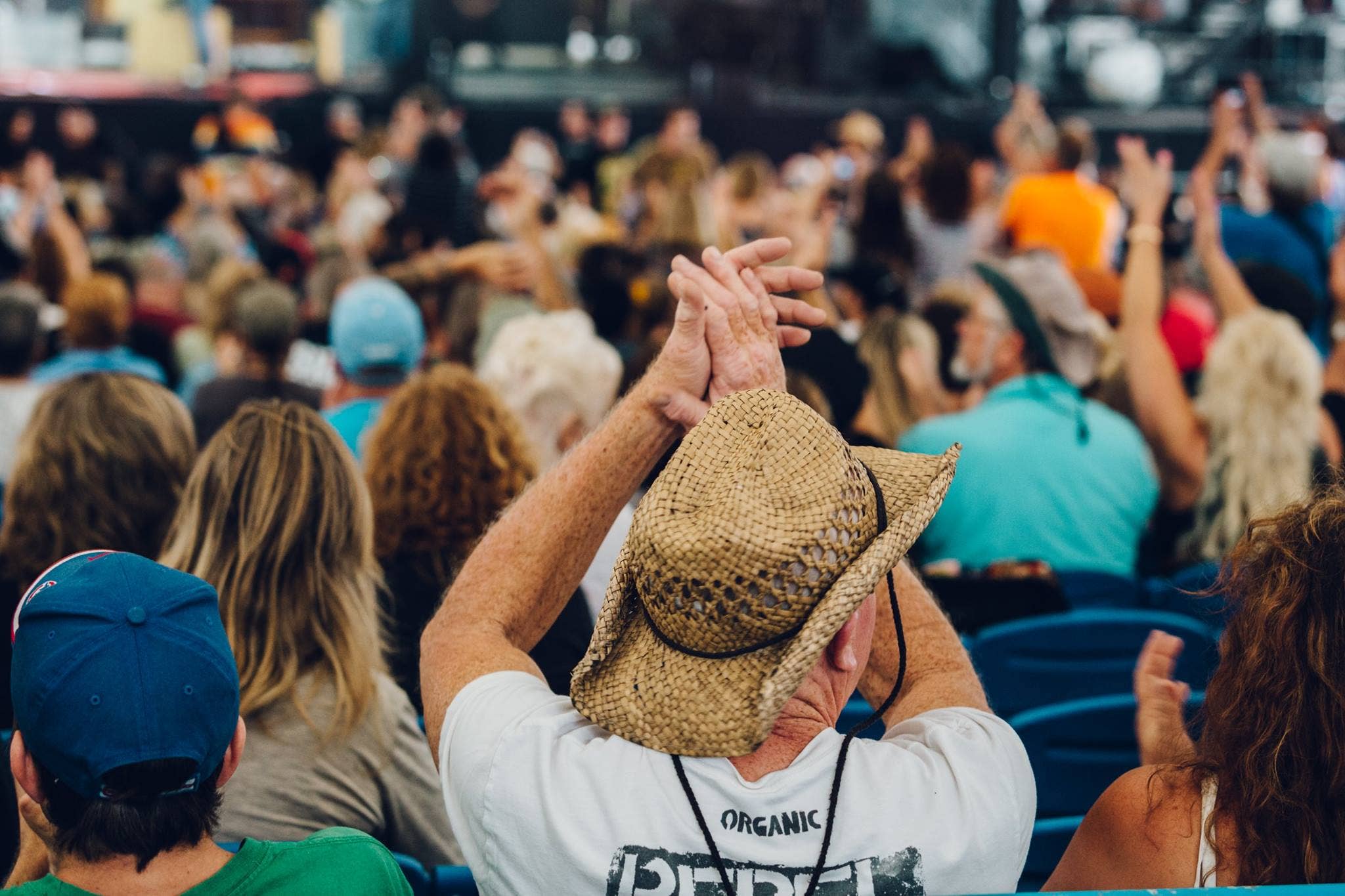 Fan clapping during show. 