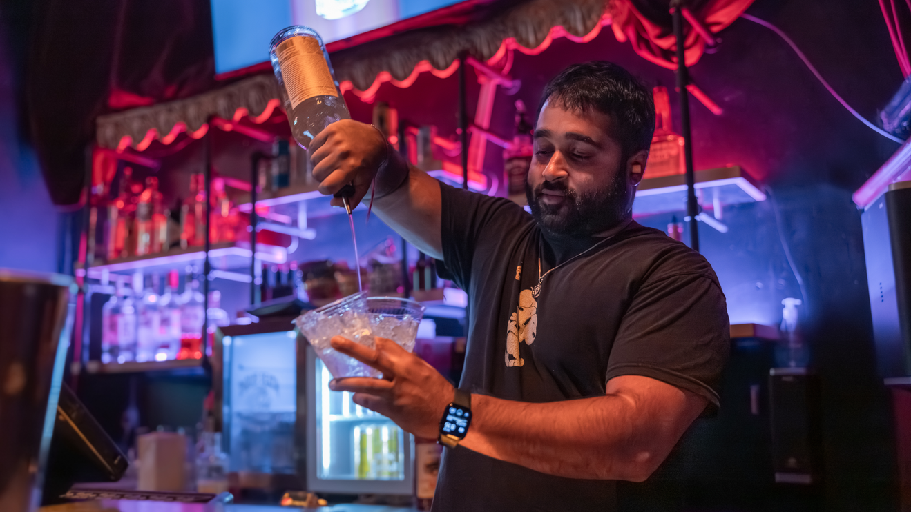 A bartender makes a drink at Gramercy Theatre