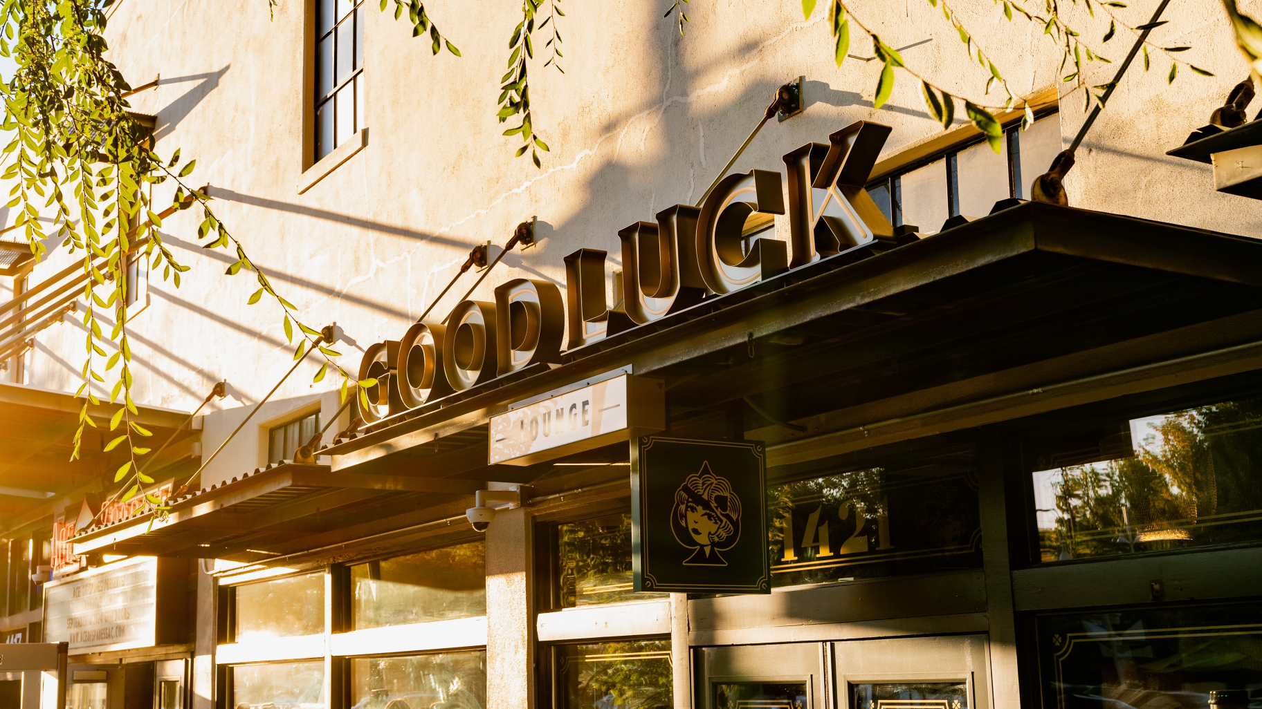 The good luck lounge outdoor signage