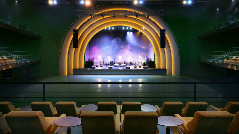 Empty seating in the balcony facing the stage