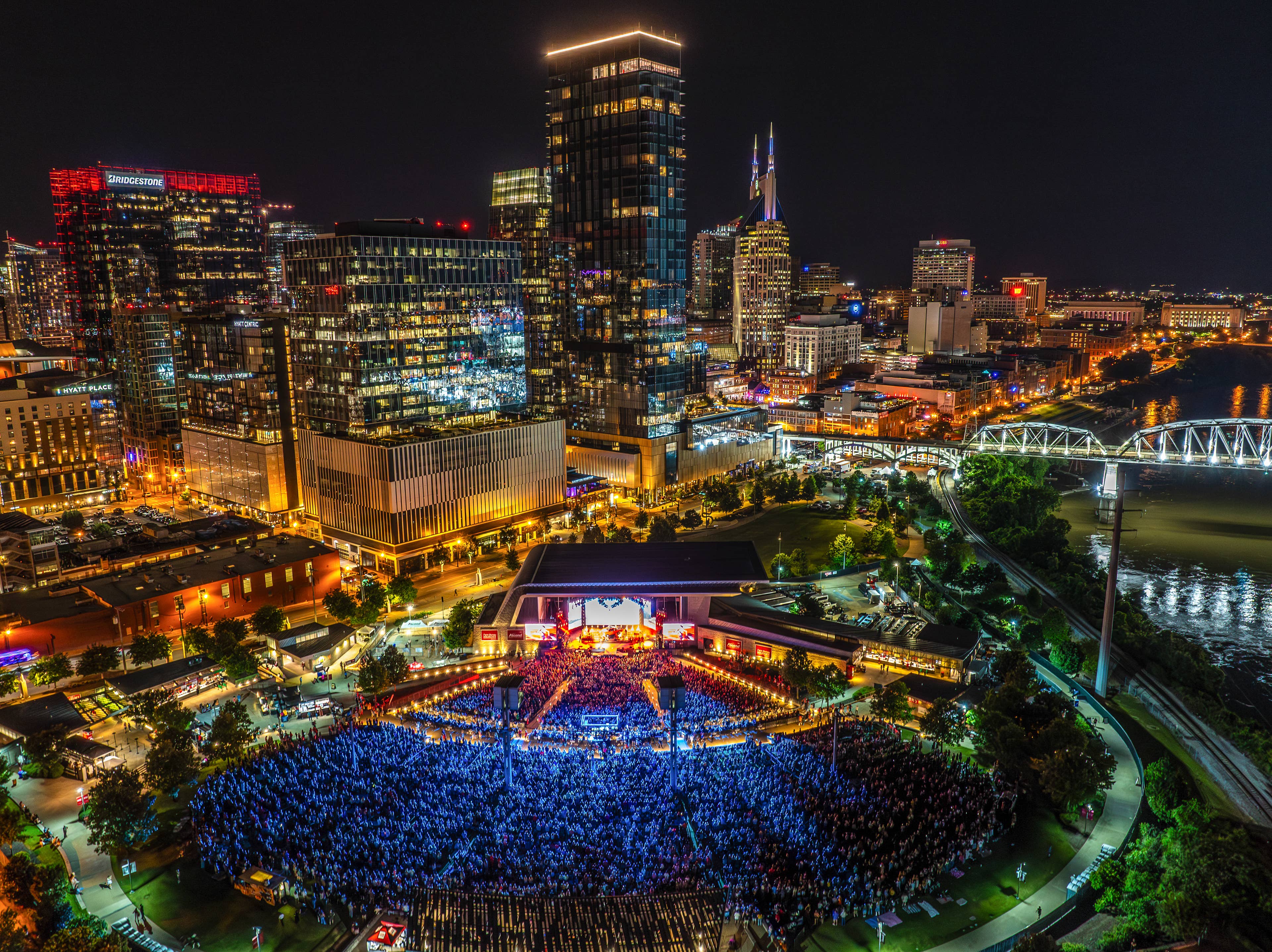 An aerial view of Ascend Amphitheater at night during a show.