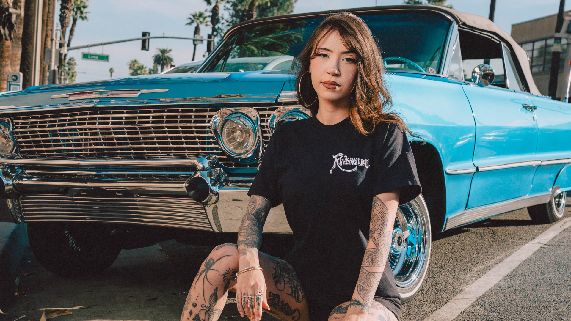 model posing with merch