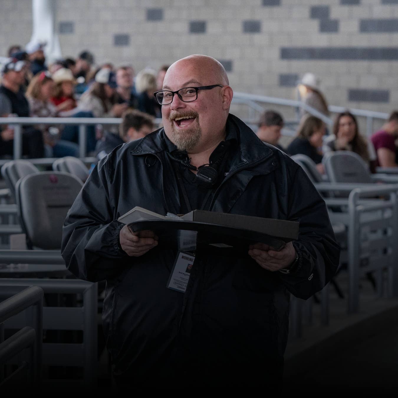 One of the friendly staff members at Everwise Amphitheater assisting a guest. 