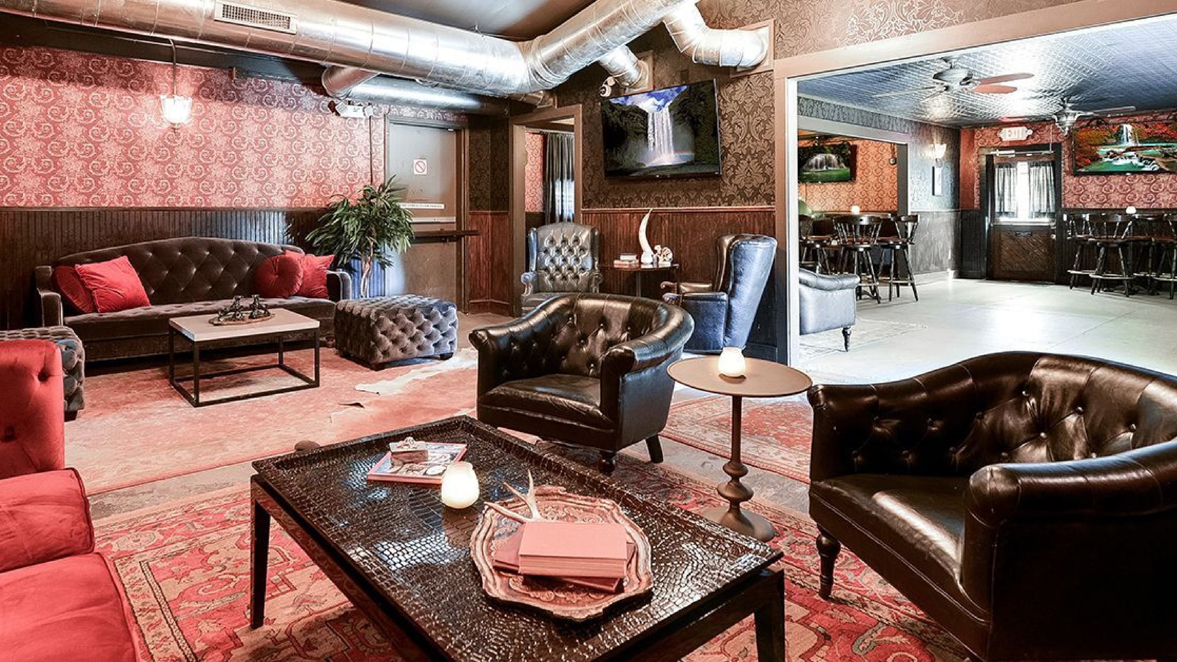 Leather chairs and tables in the Longhorn Lounge