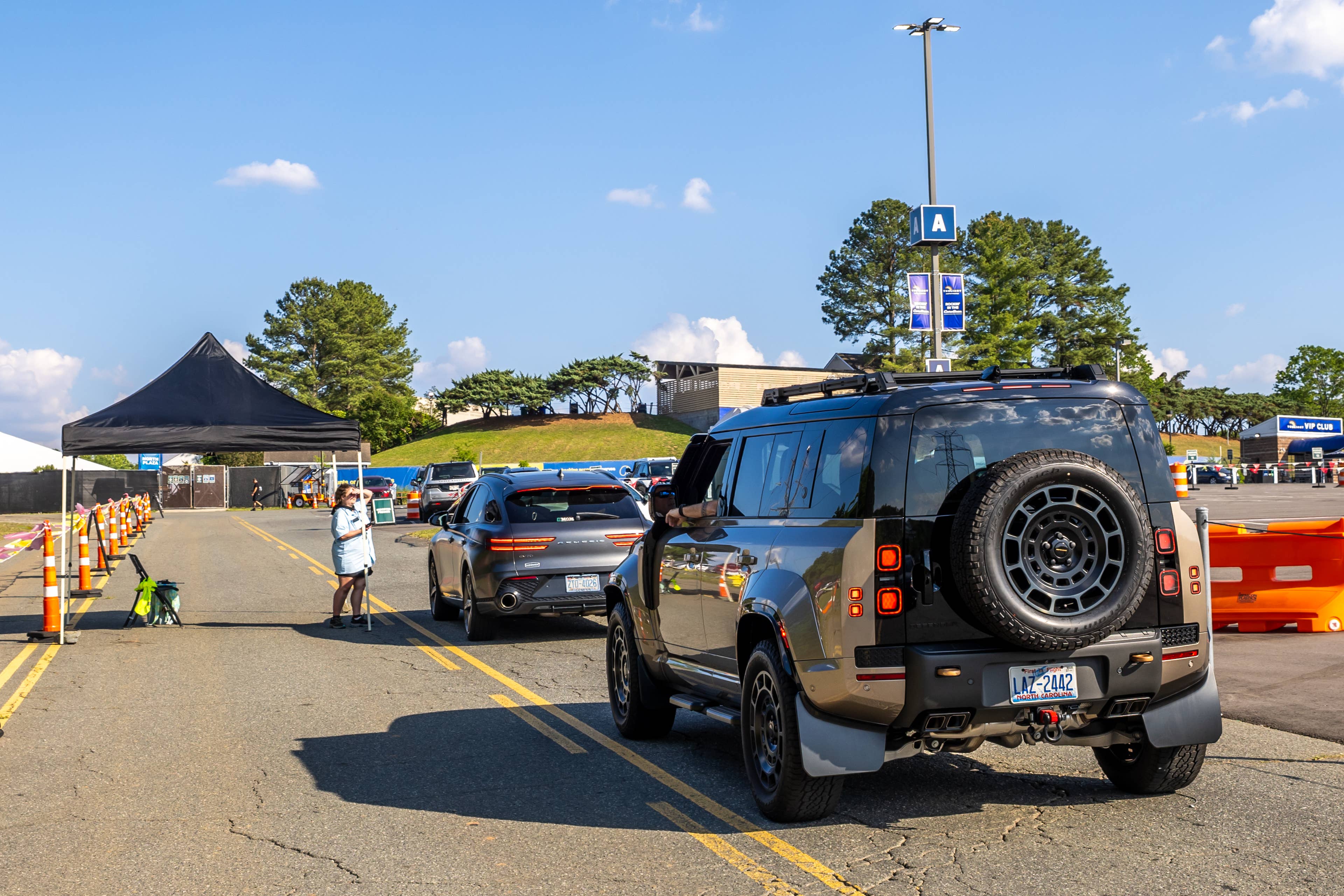 Live Nation presents Pitbull at Truliant Amphitheater in Charlotte, North Carolina on May 20, 2026 and this photo shows people entering the premier parking area.