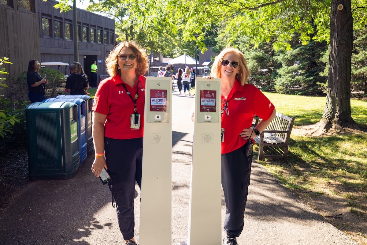 Two people working at the Blossom Music Center