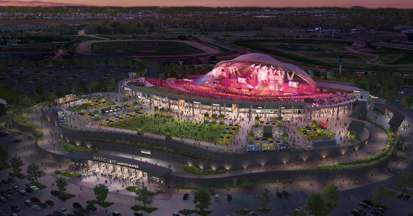 A rendering of an amphitheater with a crowd at an event. 